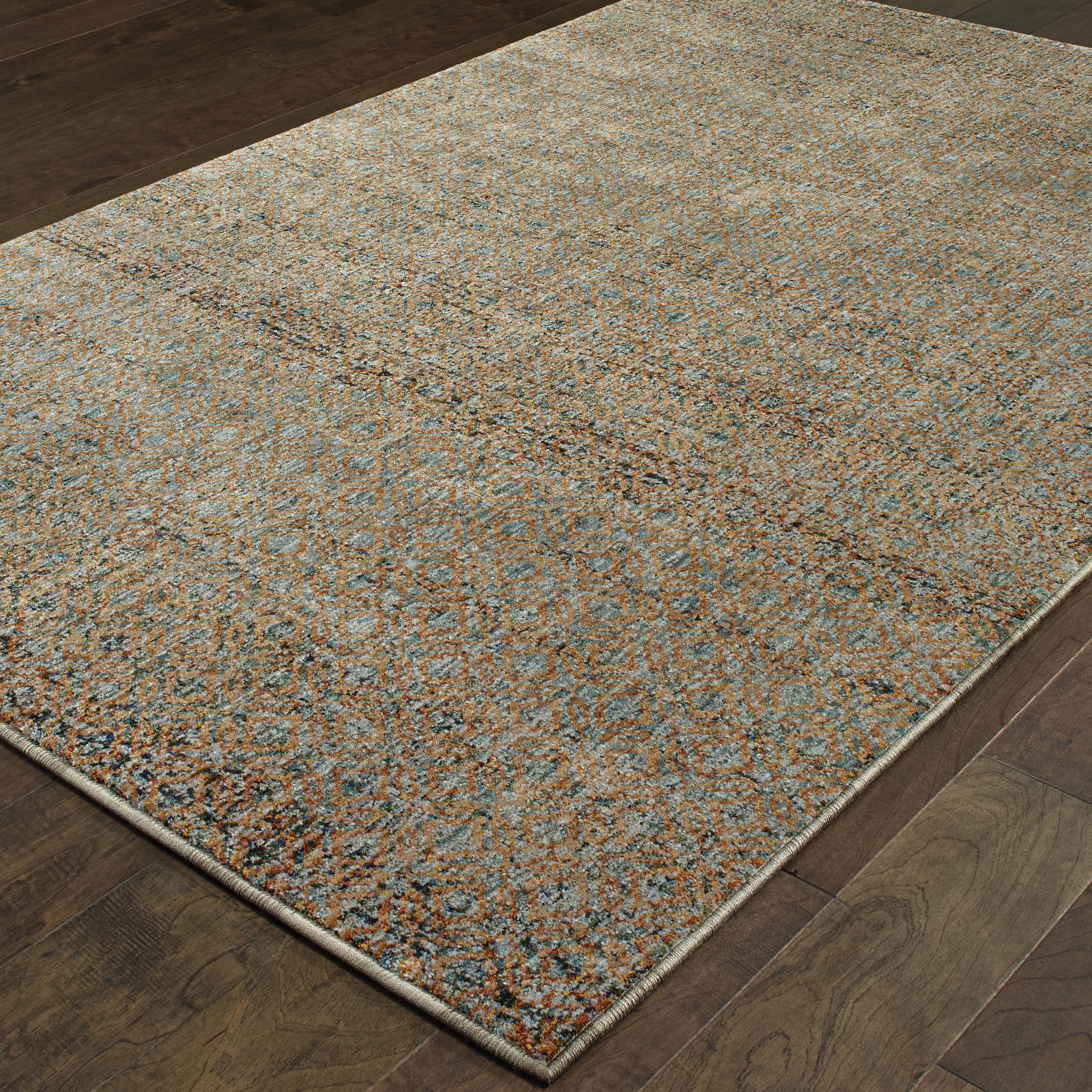 Oriental Weavers Atlas 8048B textured area rug featuring textured design in blue/ gold tones