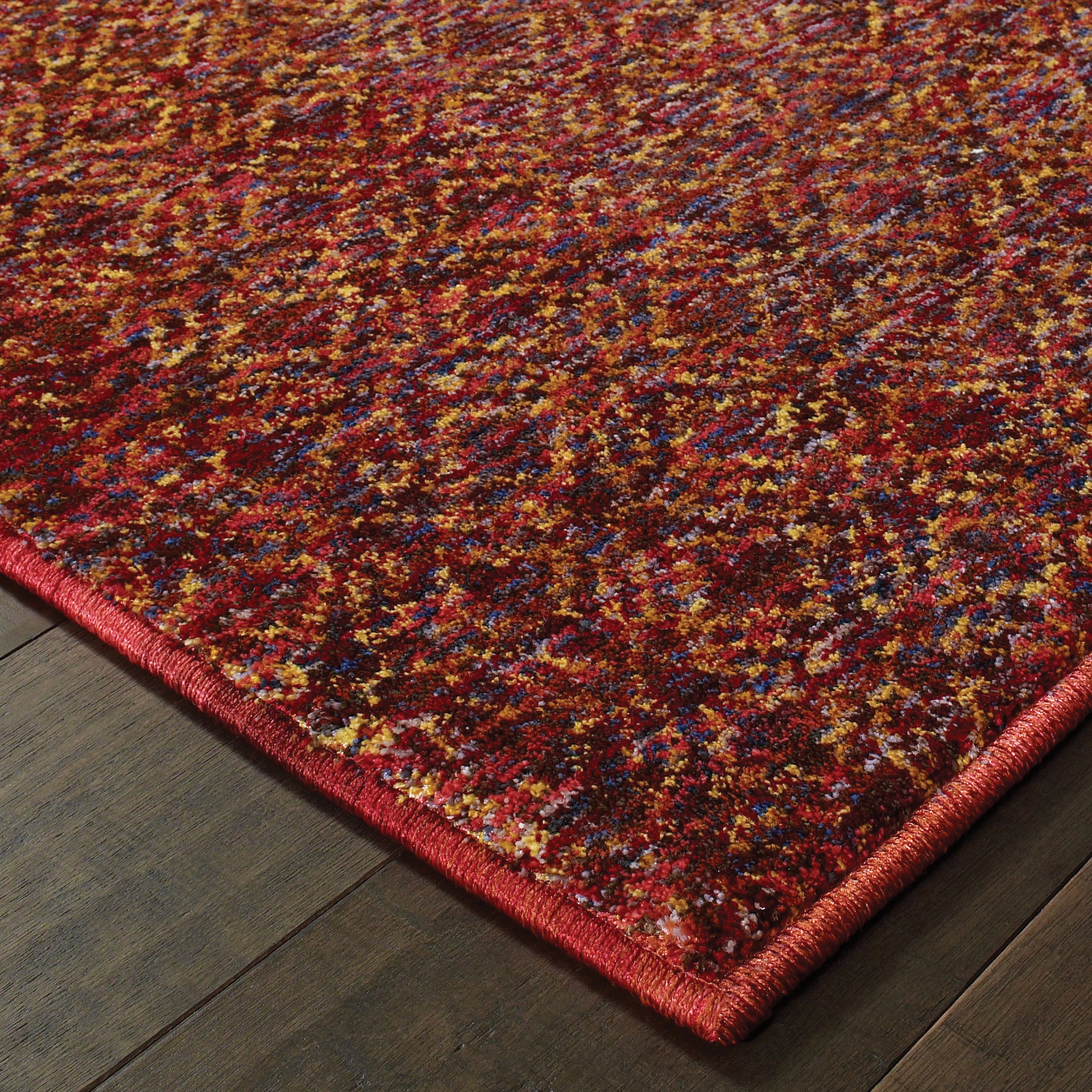 Oriental Weavers Atlas 8048K textured area rug featuring textured design in red/ rust tones