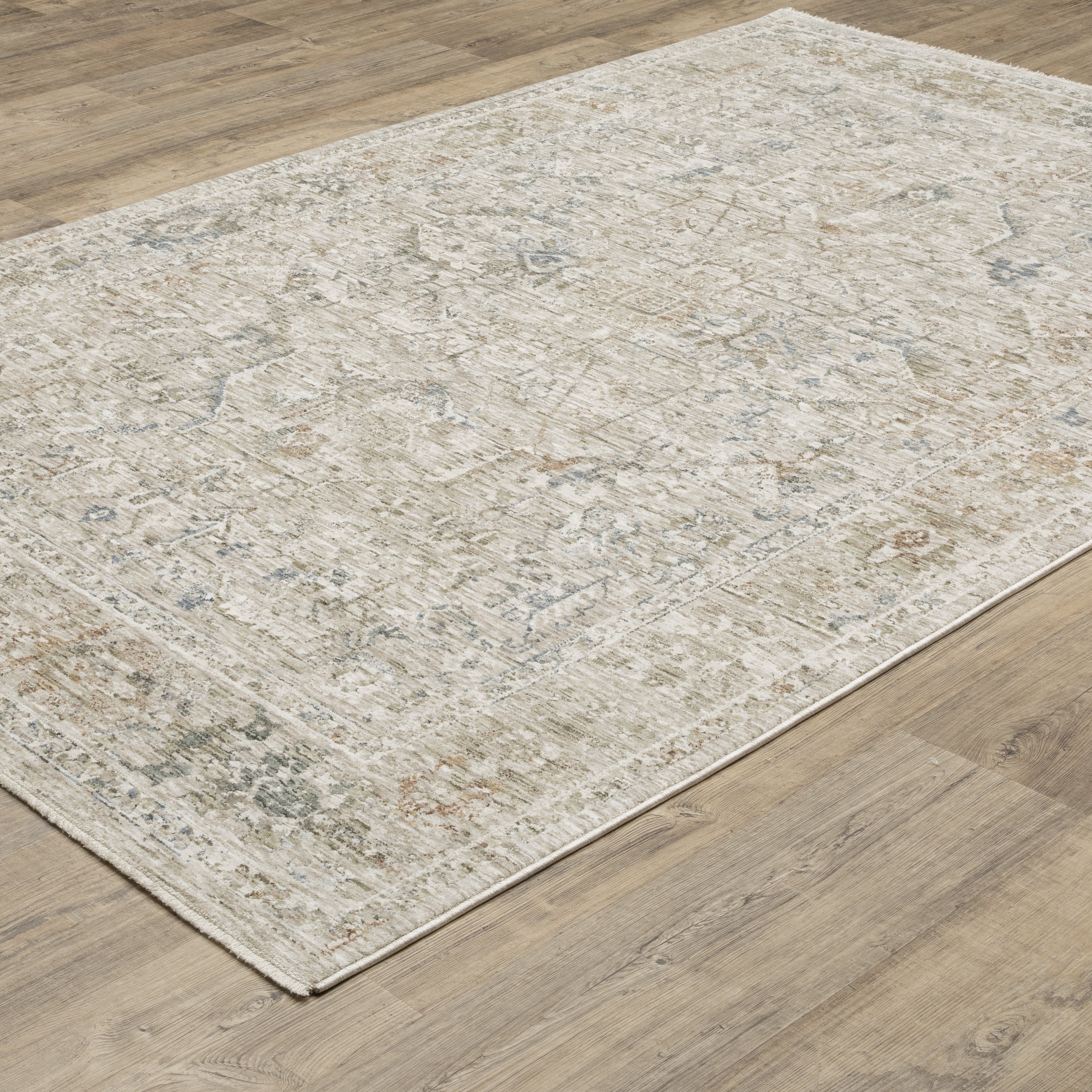 Oriental Weavers Avalon AVA02 soft transitional rug featuring decorative pattern in beige/ blue tones