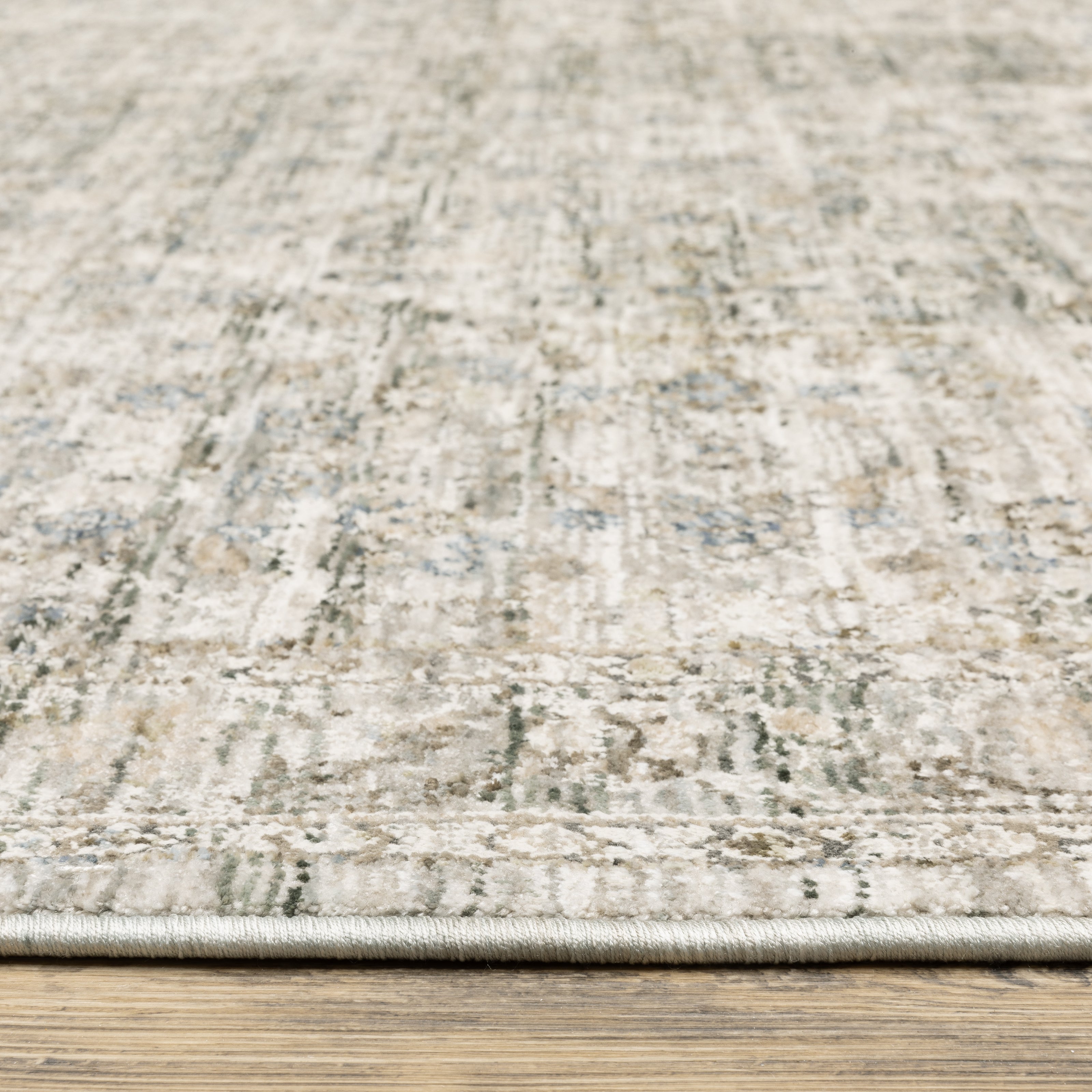 Oriental Weavers Avalon AVA04 soft transitional rug featuring decorative pattern in grey/ beige tones