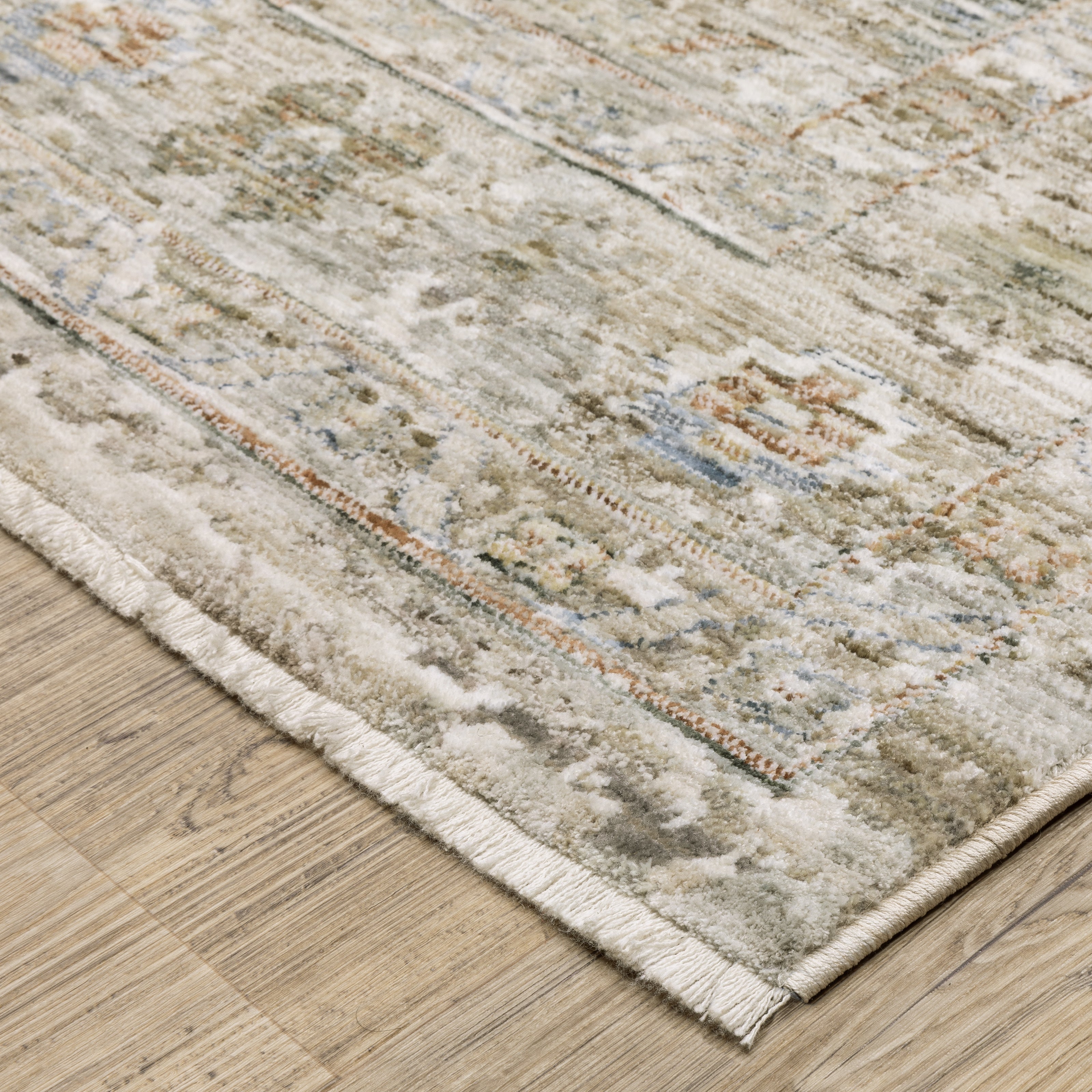 Oriental Weavers Avalon AVA05 soft transitional rug featuring decorative pattern in beige/ grey tones