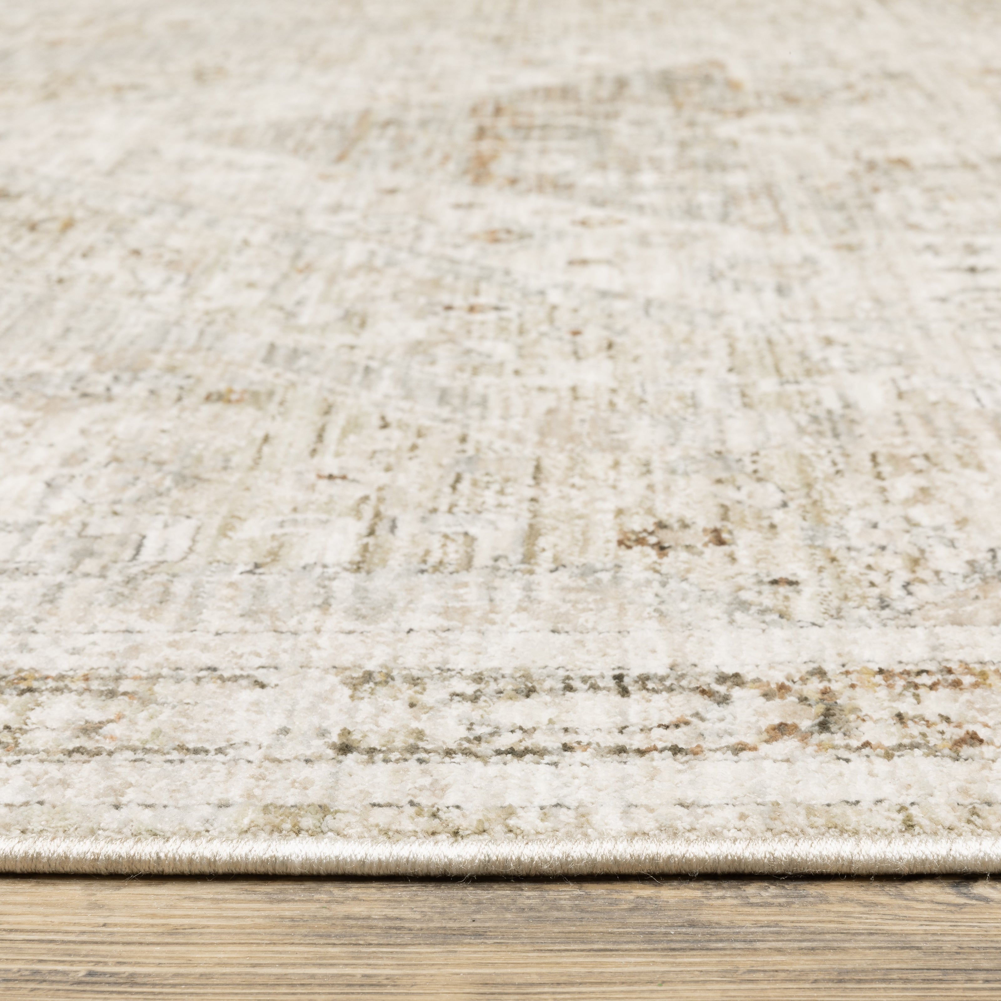 Oriental Weavers Avalon AVA06 soft transitional rug featuring decorative pattern in beige/ ivory tones