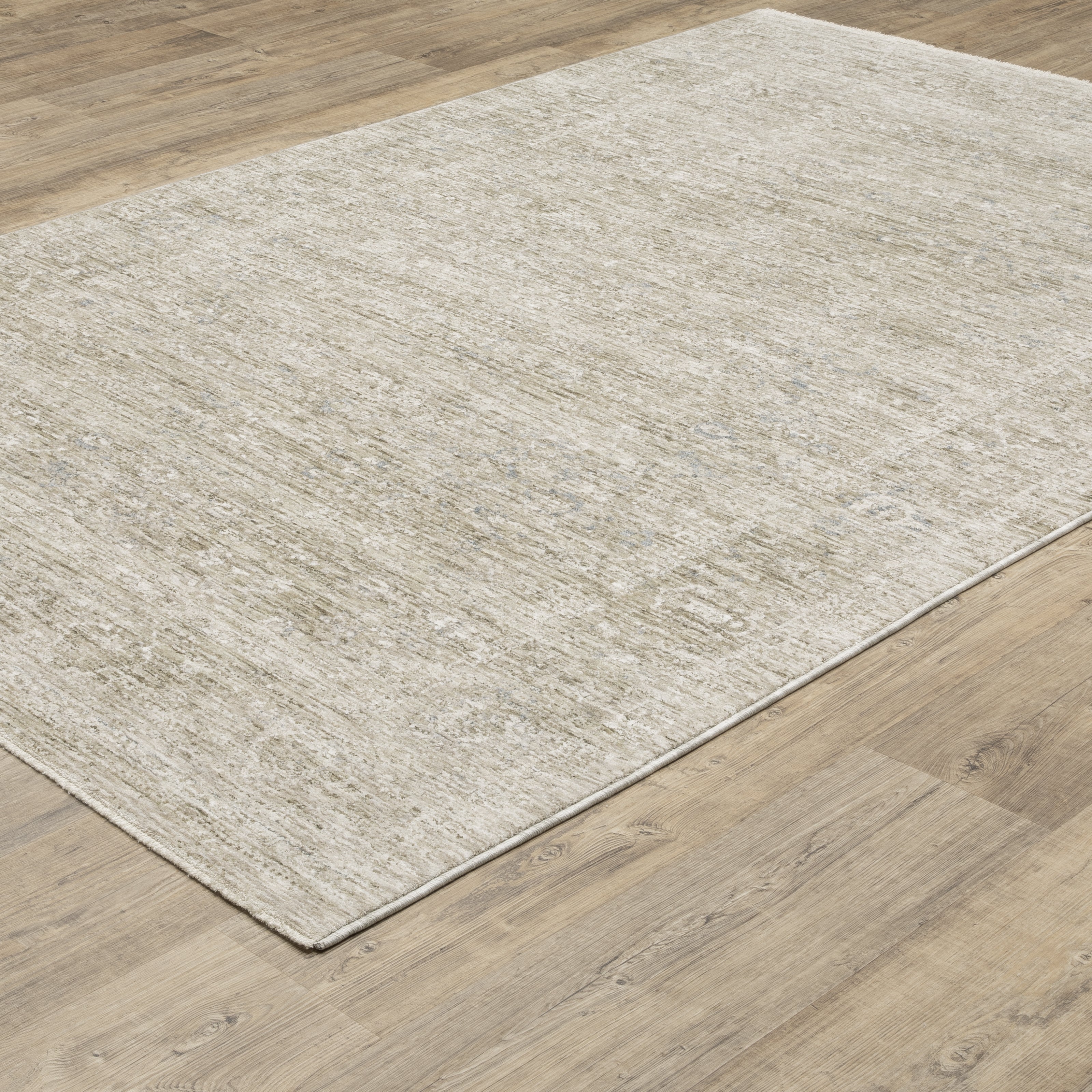 Oriental Weavers Avalon AVA07 soft transitional rug featuring decorative pattern in beige/ grey tones