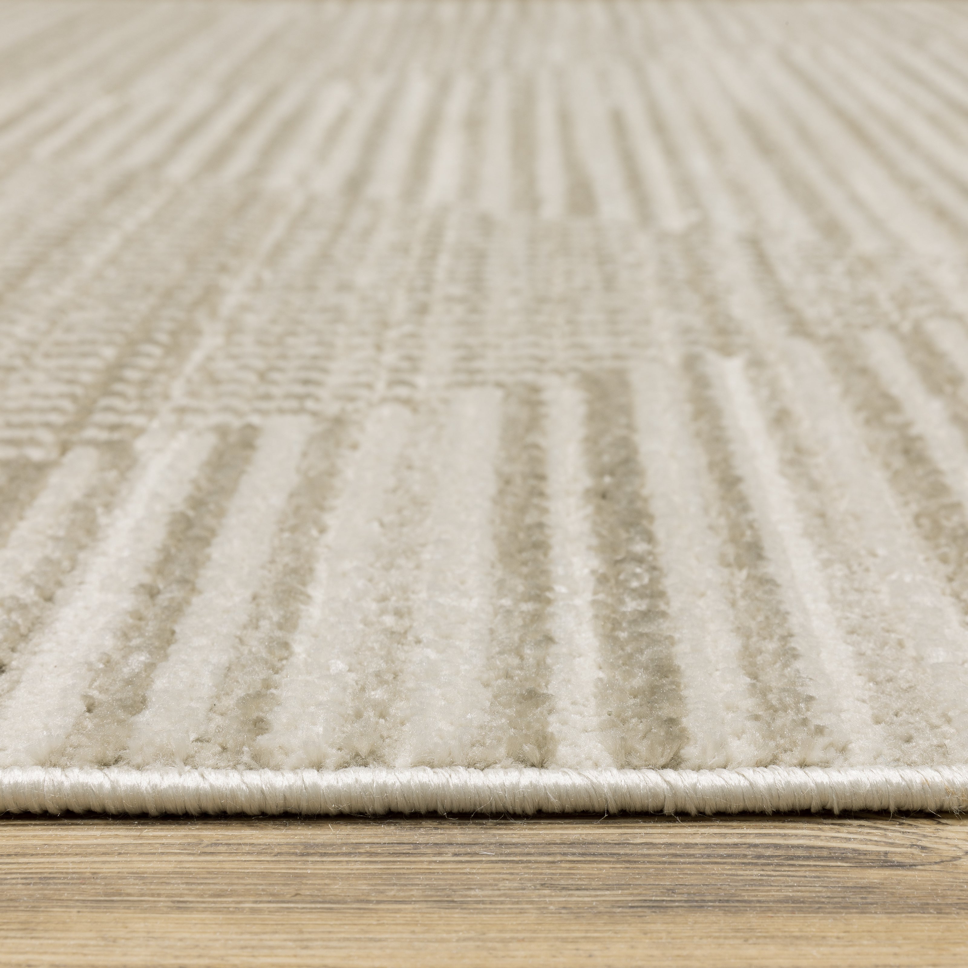 Oriental Weavers Bauer 4150E plush modern rug featuring abstract pattern in beige/ ivory tones
