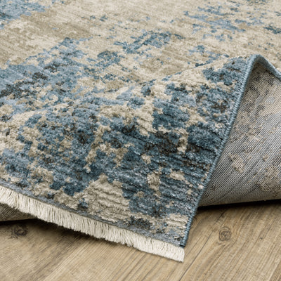 Oriental Weavers Bauer 041L2 plush modern rug featuring abstract pattern in blue/ beige tones