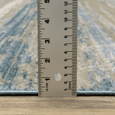 Oriental Weavers Bauer 042L2 plush modern rug featuring abstract pattern in blue/ beige tones