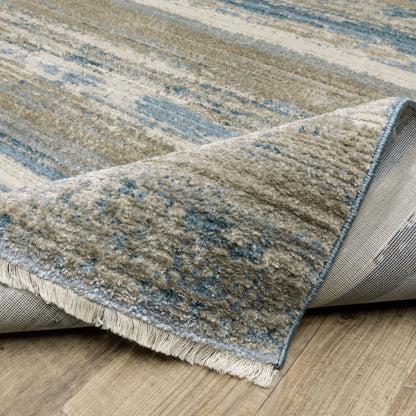 Oriental Weavers Bauer 042L2 plush modern rug featuring abstract pattern in blue/ beige tones
