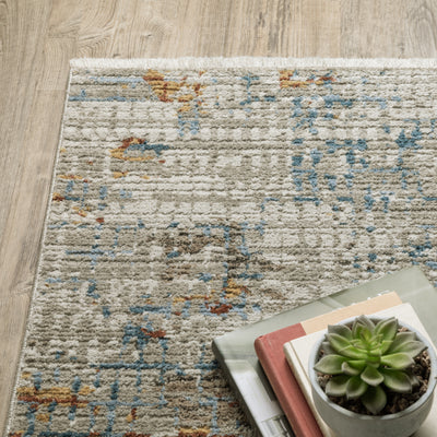 Oriental Weavers Bauer 005E2 plush modern rug featuring abstract pattern in beige/ multi tones