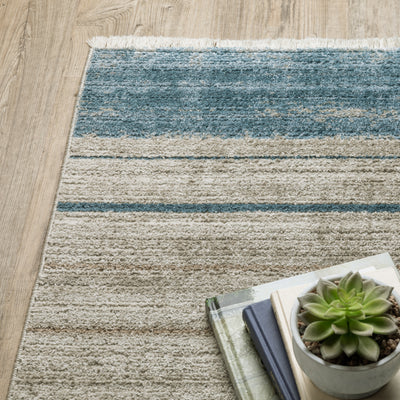 Oriental Weavers Bauer 090B2 plush modern rug featuring abstract pattern in blue/ beige tones