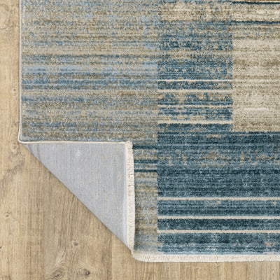 Oriental Weavers Bauer 090B2 plush modern rug featuring abstract pattern in blue/ beige tones