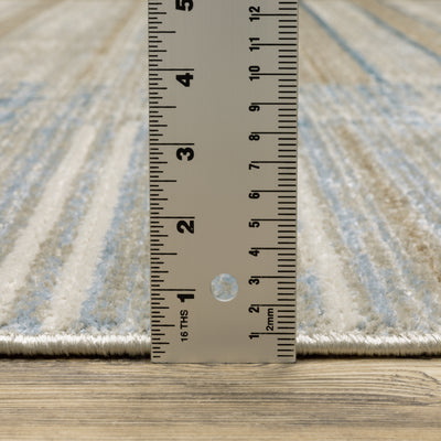 Oriental Weavers Bauer 090B2 plush modern rug featuring abstract pattern in blue/ beige tones