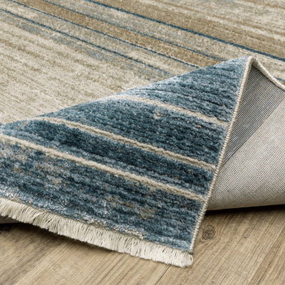 Oriental Weavers Bauer 090B2 plush modern rug featuring abstract pattern in blue/ beige tones