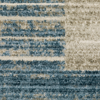 Oriental Weavers Bauer 090B2 plush modern rug featuring abstract pattern in blue/ beige tones