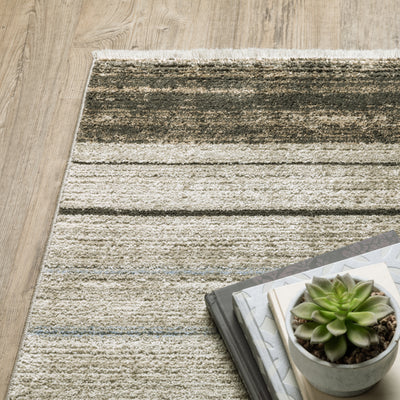 Oriental Weavers Bauer 090N2 plush modern rug featuring abstract pattern in beige/ charcoal tones