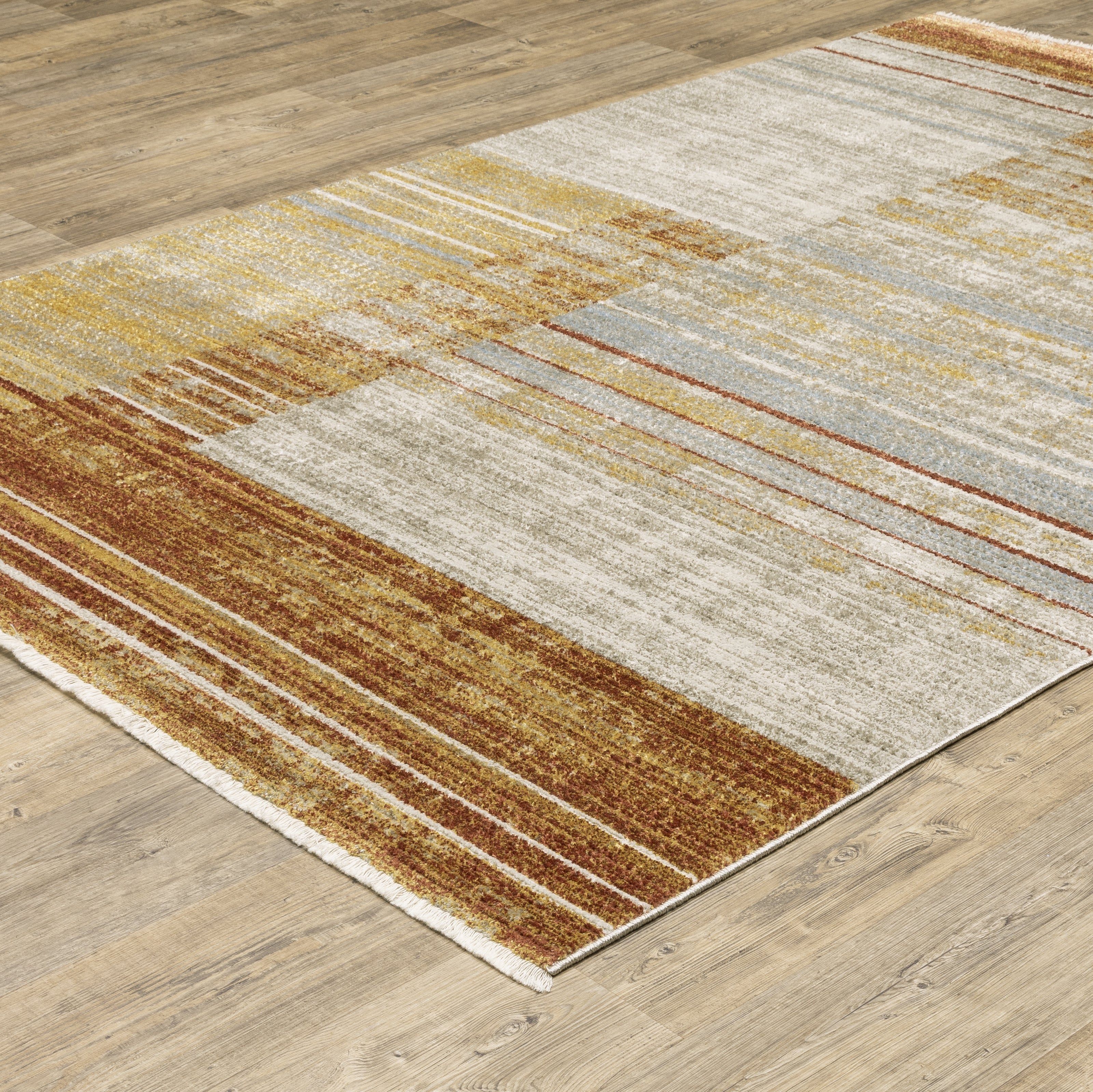 Oriental Weavers Bauer 090R2 plush modern rug featuring abstract pattern in rust/ gold tones