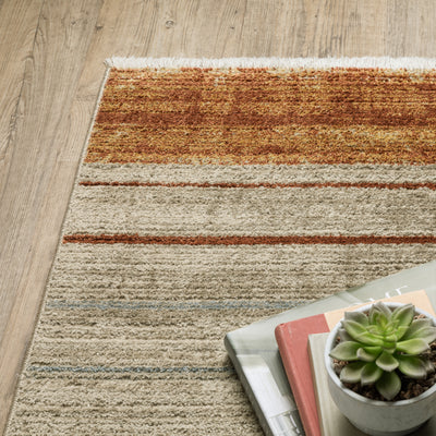 Oriental Weavers Bauer 090R2 plush modern rug featuring abstract pattern in rust/ gold tones