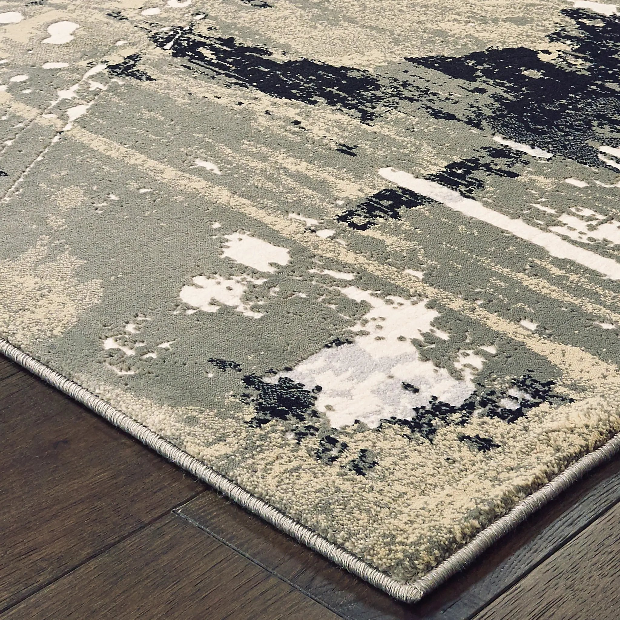 Bowen 109E2 Black/ Gold Area Rug by Oriental Weavers