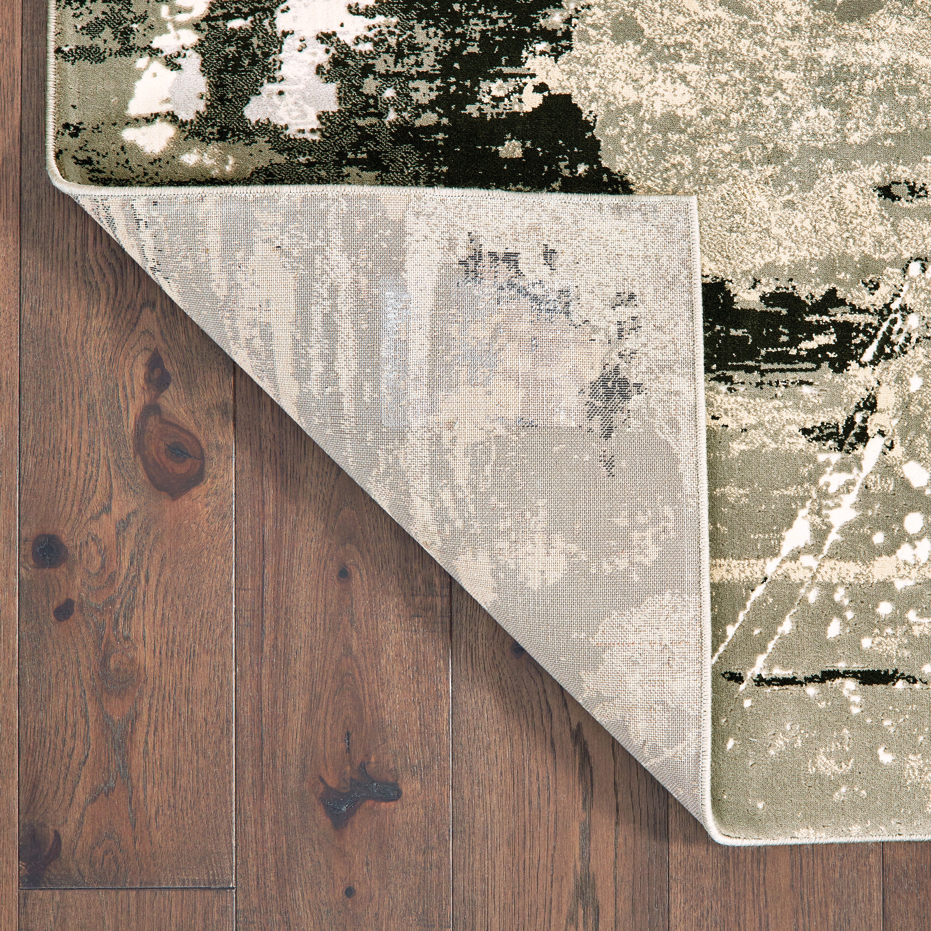 Oriental Weavers Bowen 109E2 soft transitional rug featuring textured design in black/ gold tones