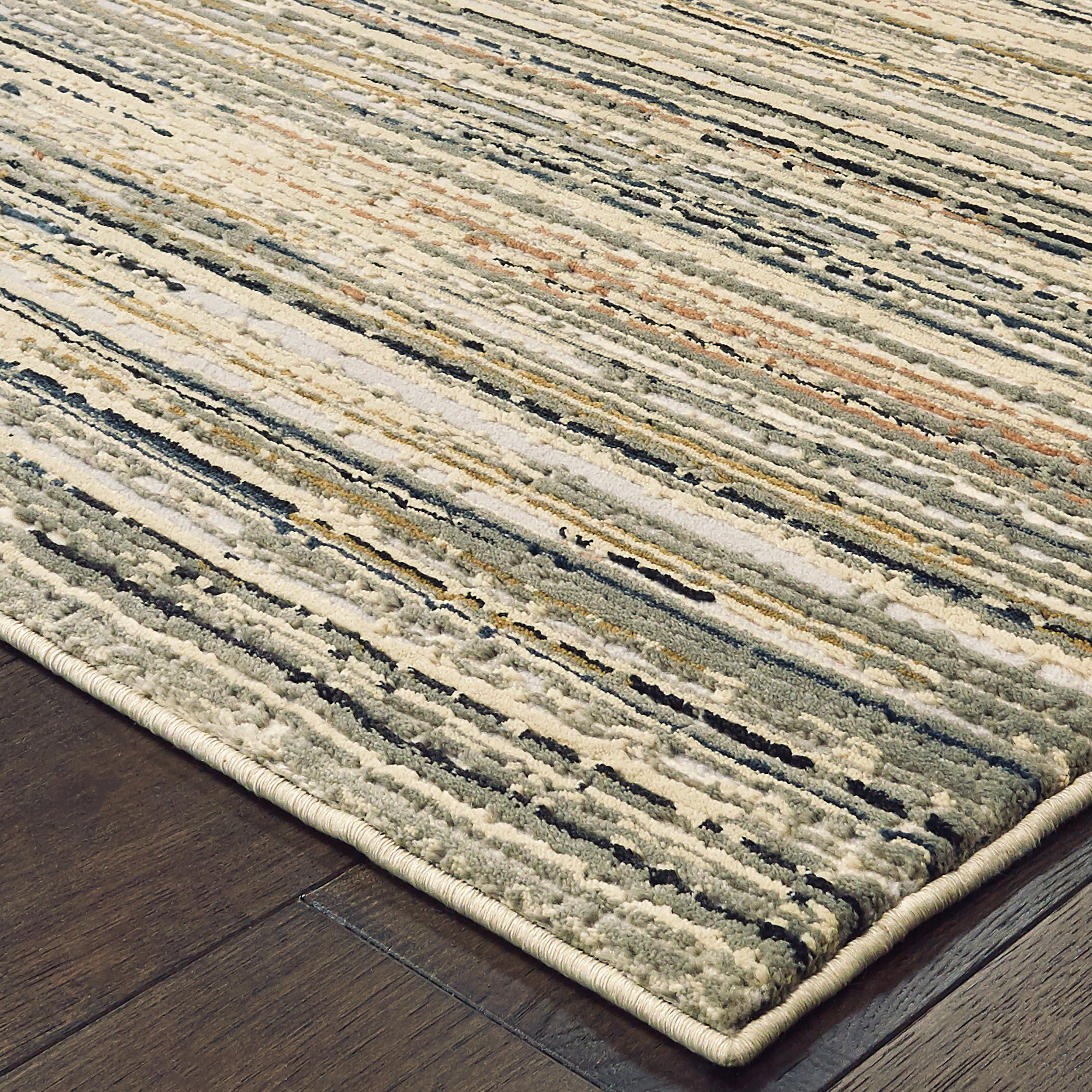 Oriental Weavers Bowen 1332J soft transitional rug featuring textured design in ivory/ gold tones
