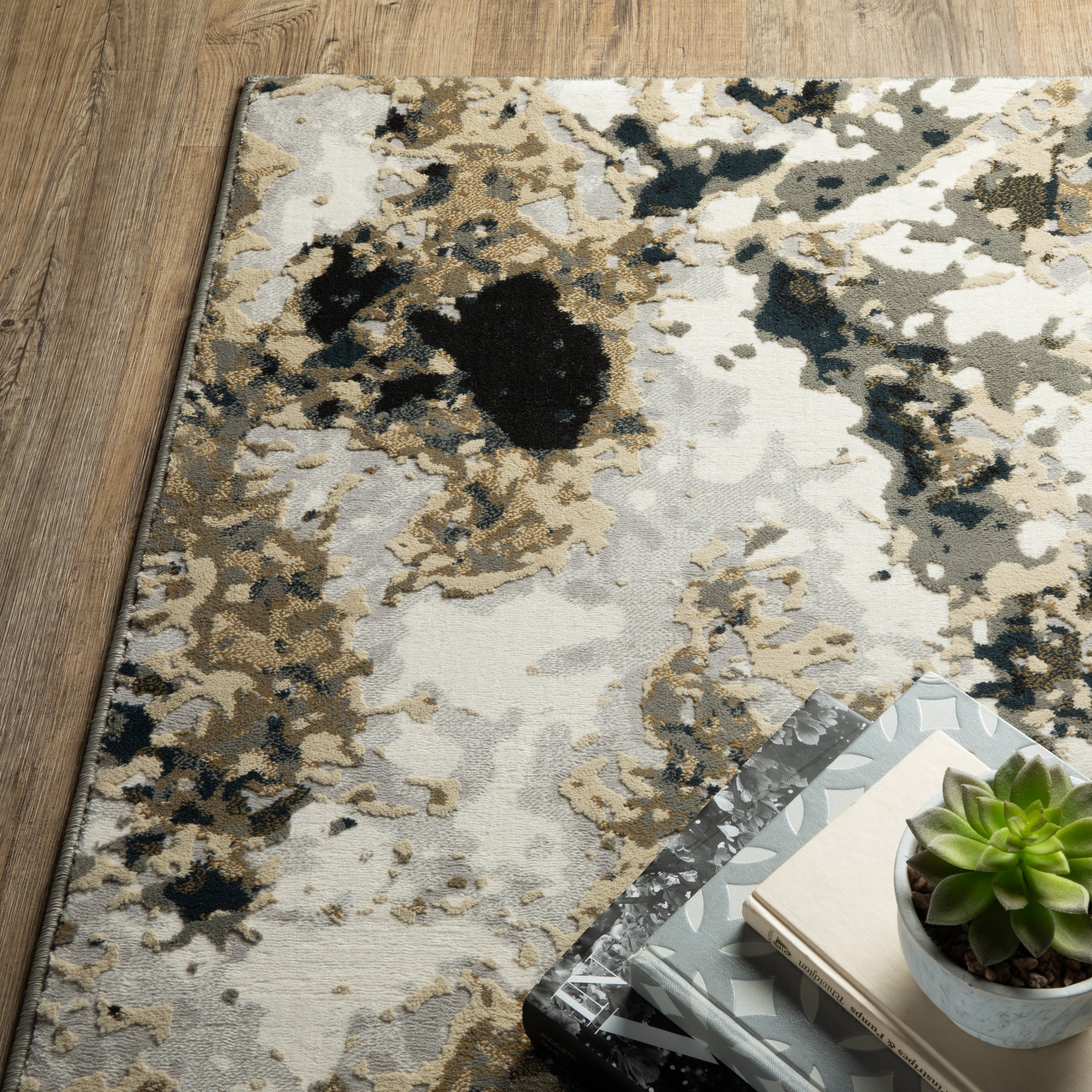 Oriental Weavers Bowen 1808Q soft transitional rug featuring textured design in navy/ gold tones