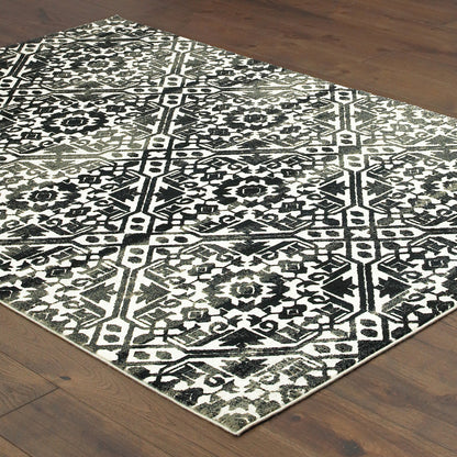 Oriental Weavers Bowen 5506E soft transitional rug featuring textured design in navy/ ivory tones