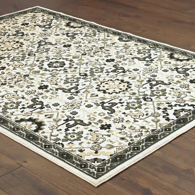 Oriental Weavers Bowen 073J2 soft transitional rug featuring textured design in ivory/ navy tones