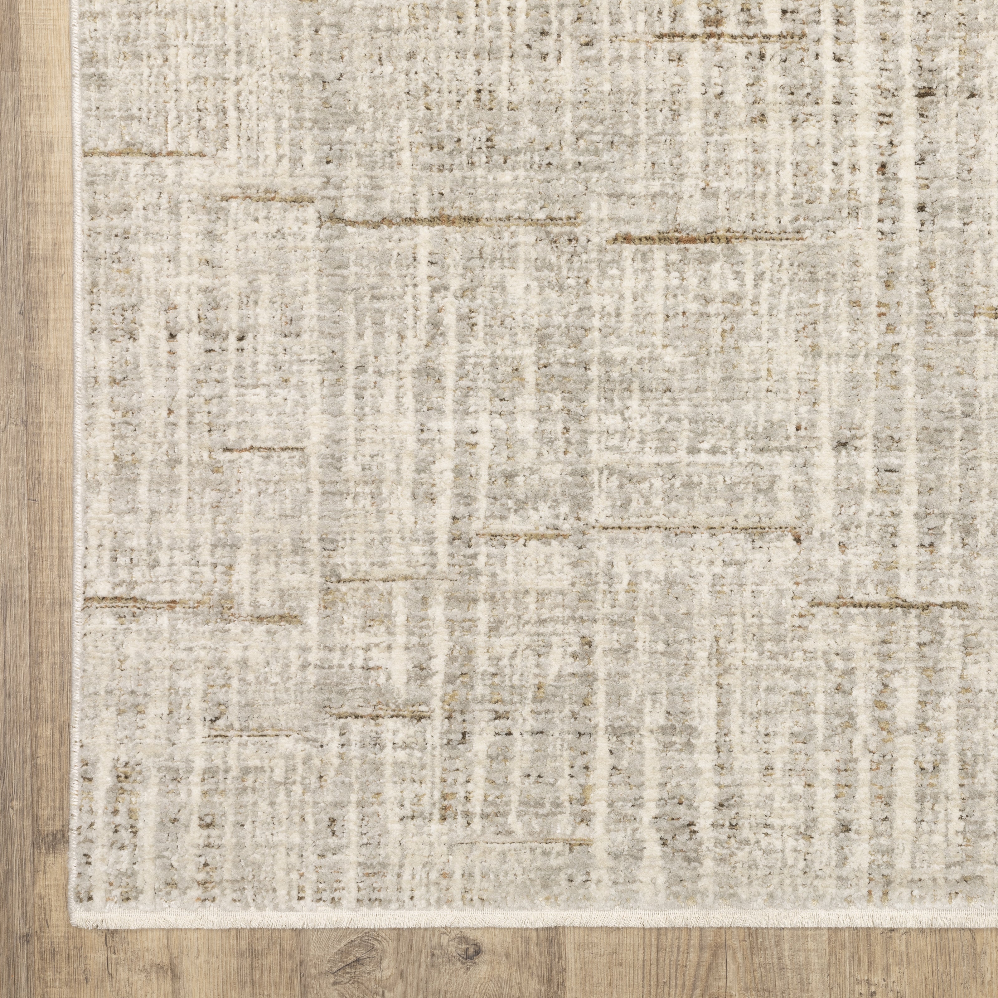 Oriental Weavers Branigan BRG02 soft modern rug featuring abstract pattern in ivory/ grey tones