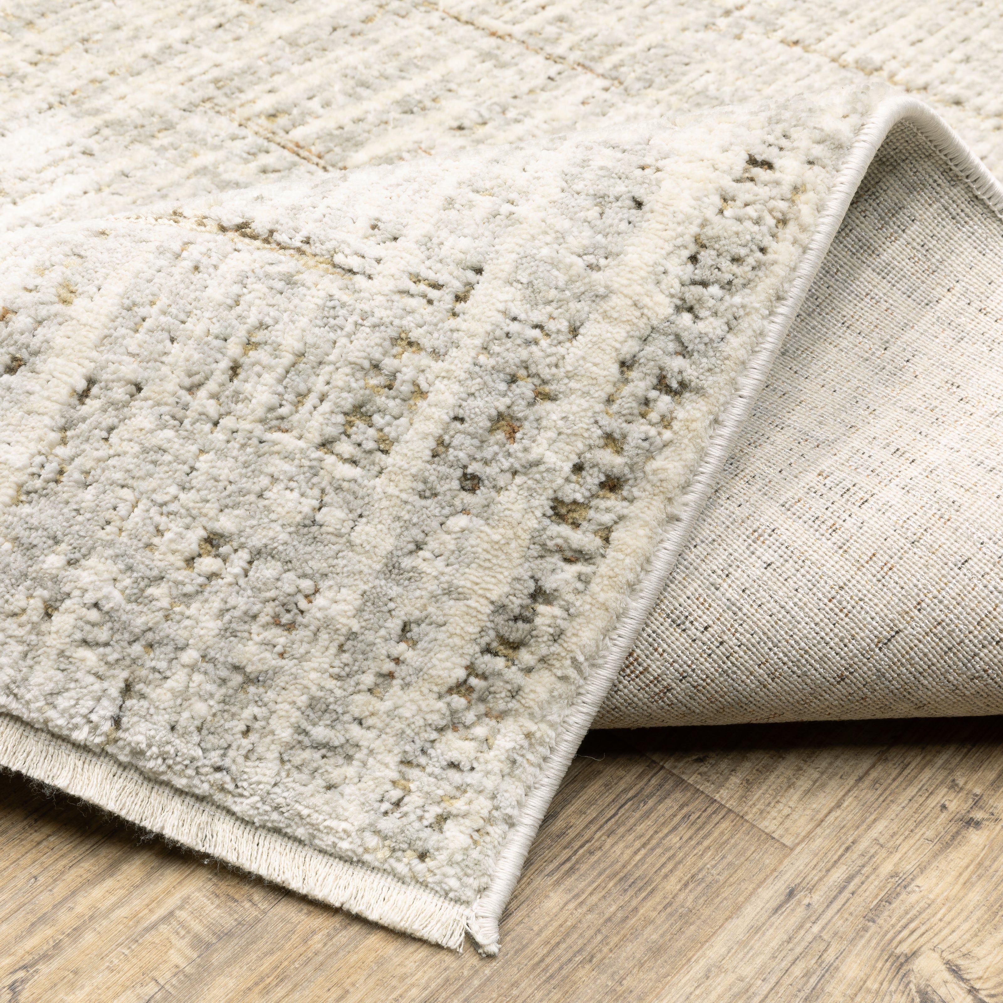 Oriental Weavers Branigan BRG02 soft modern rug featuring abstract pattern in ivory/ grey tones