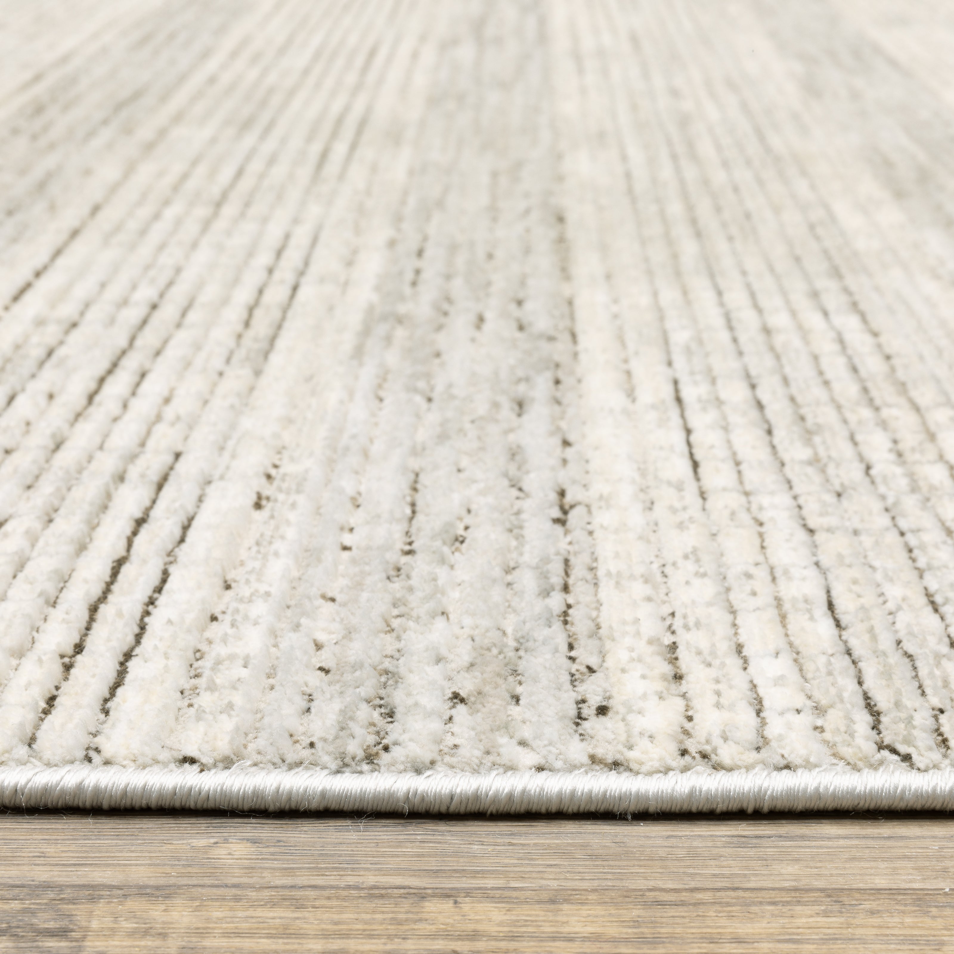Oriental Weavers Branigan BRG03 soft modern rug featuring abstract pattern in ivory / brown tones