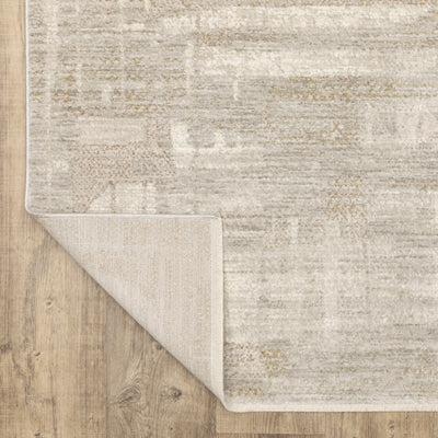 Oriental Weavers Branigan BRG04 soft traditional rug featuring abstract pattern in ivory / gold tones