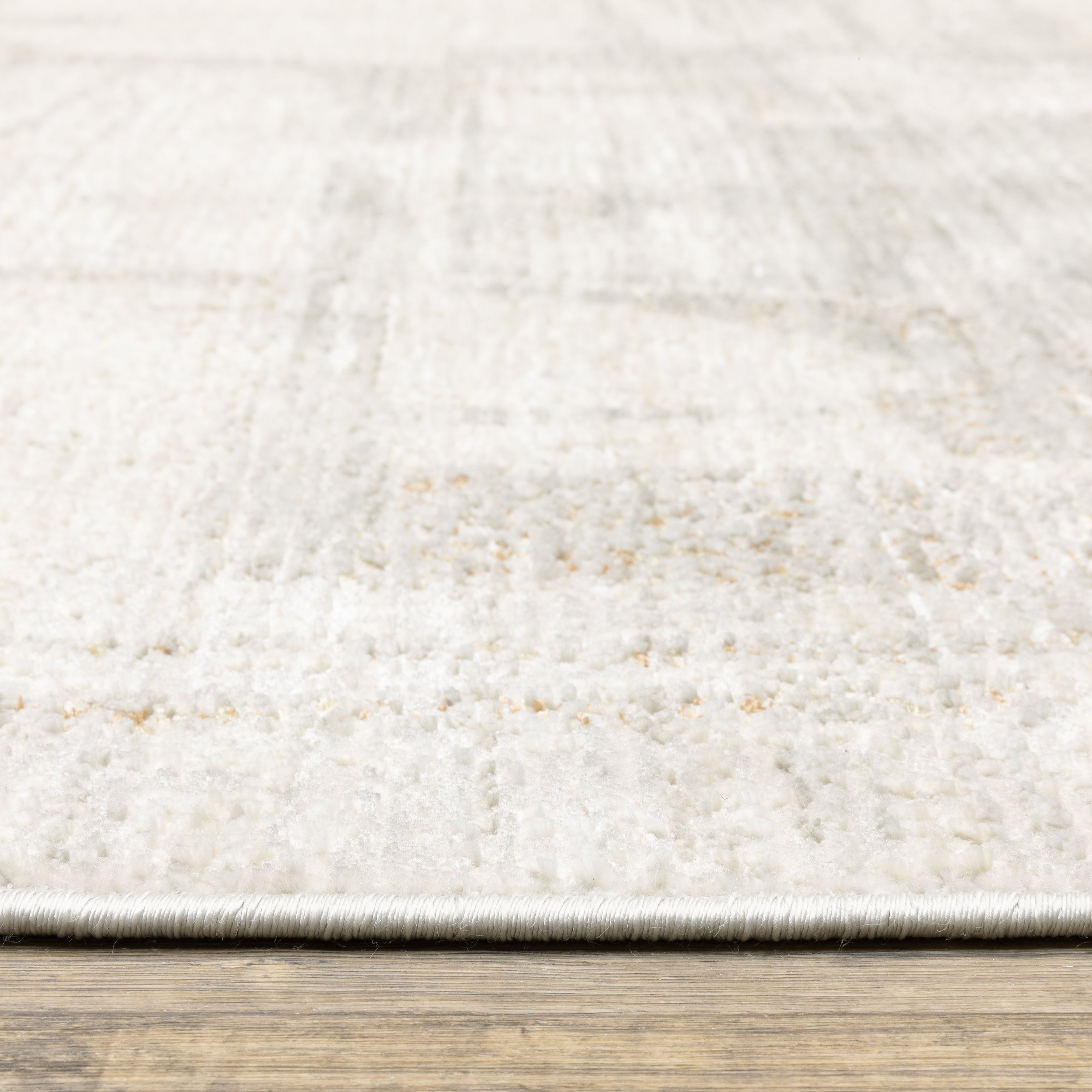 Oriental Weavers Branigan BRG04 soft traditional rug featuring abstract pattern in ivory / gold tones