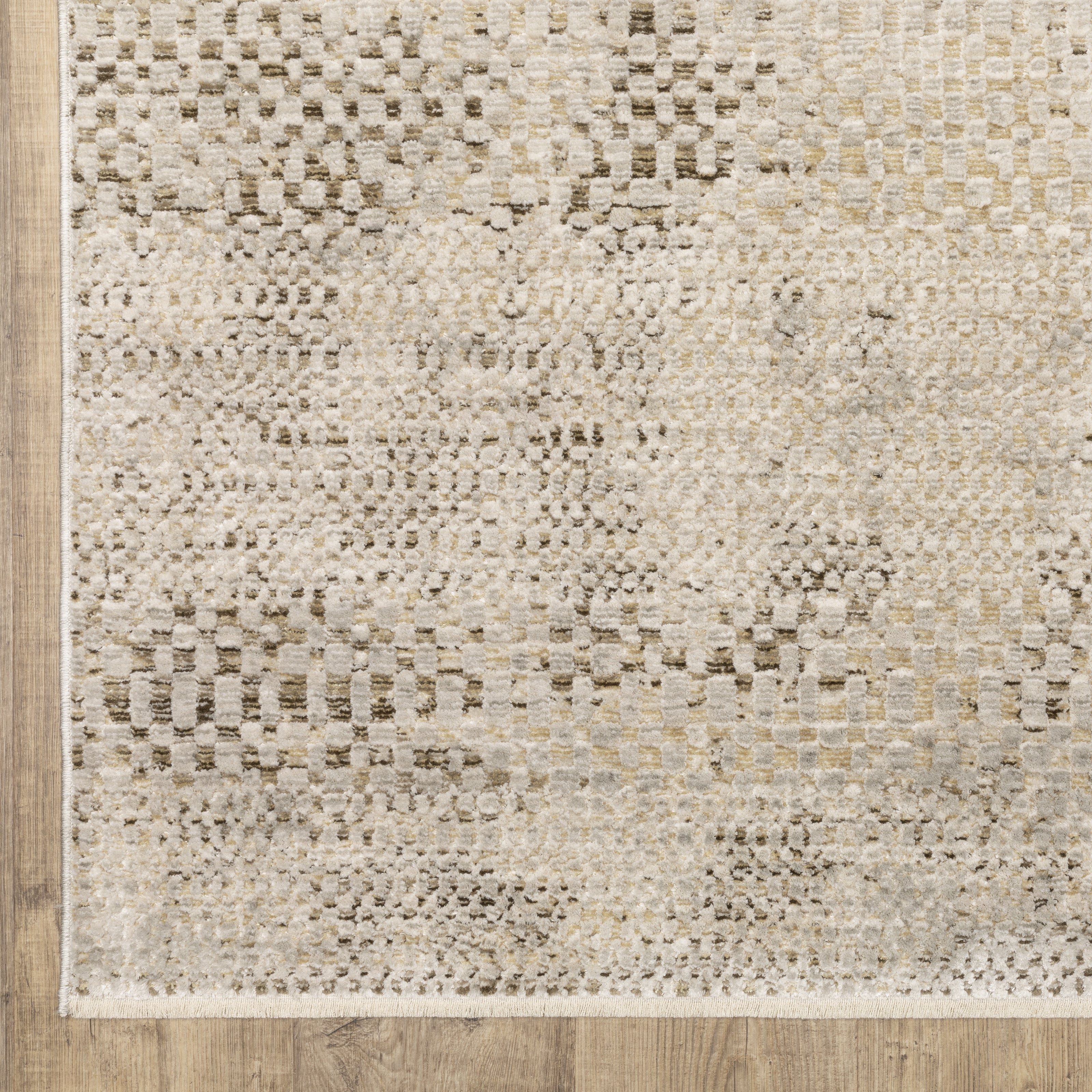 Oriental Weavers Branigan BRG06 soft modern rug featuring abstract pattern in ivory / gold tones