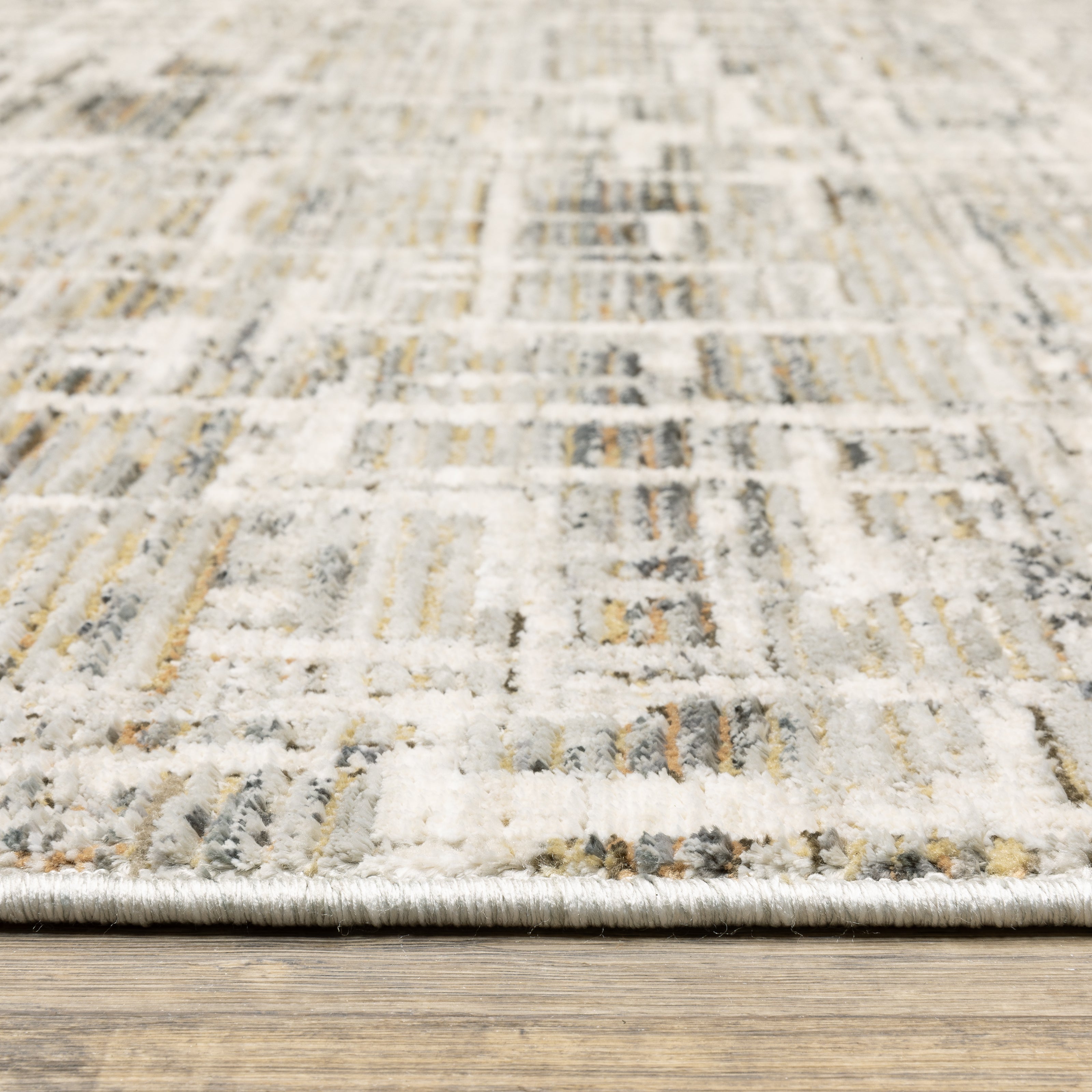 Oriental Weavers Branigan BRG08 soft modern rug featuring abstract pattern in ivory / grey tones
