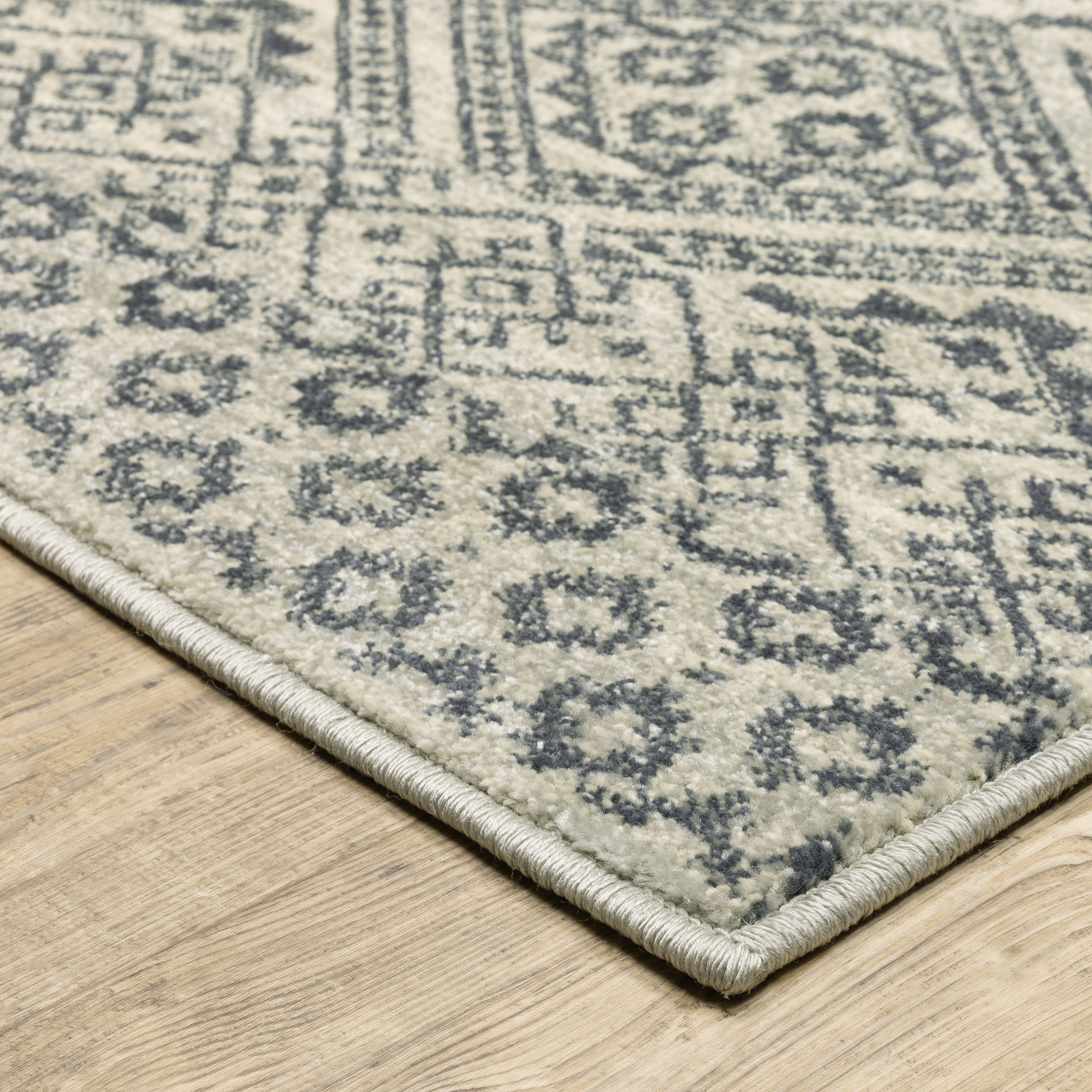 Oriental Weavers Branson BR02A soft transitional rug featuring textured design in blue/ beige tones