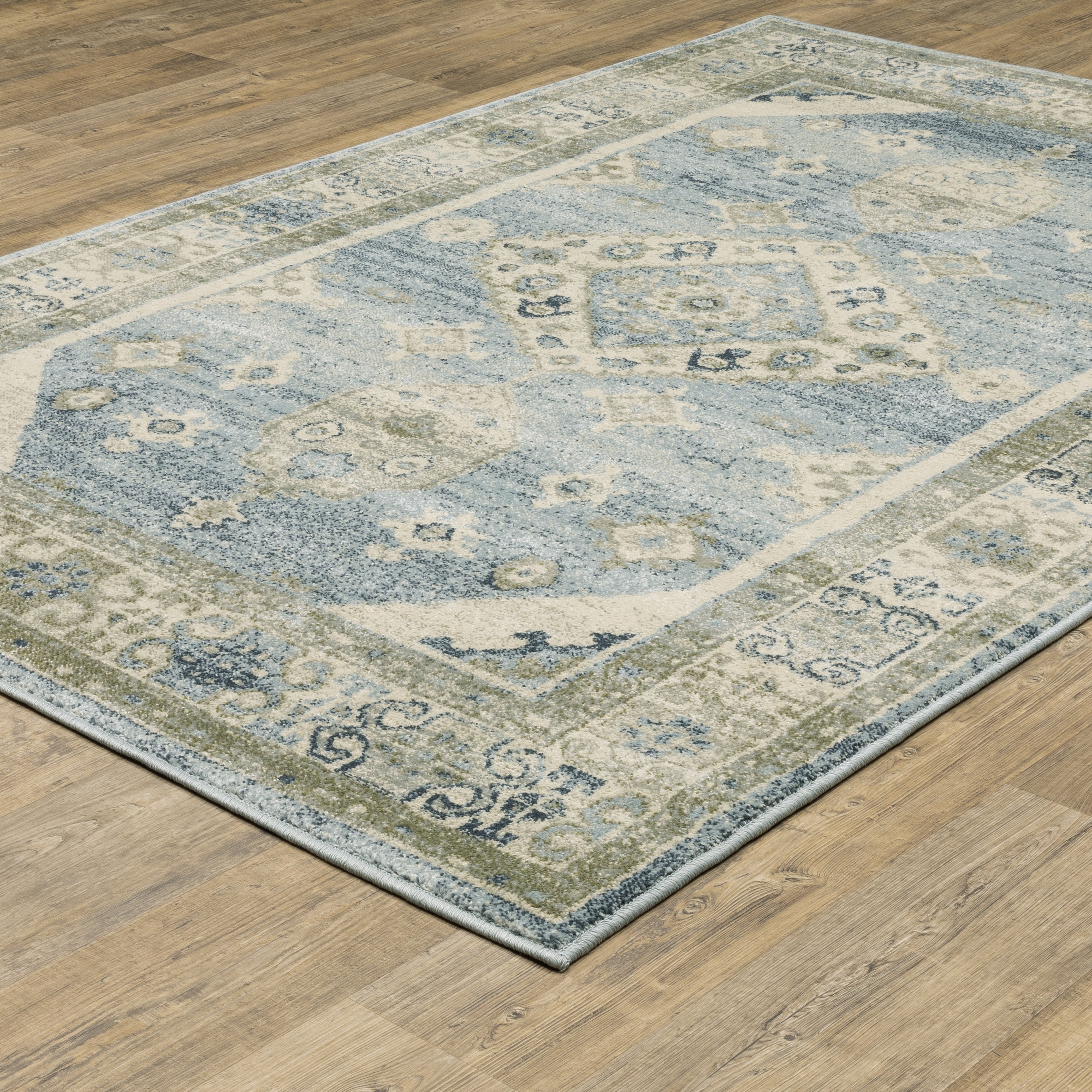 Oriental Weavers Branson BR03A soft transitional rug featuring textured design in blue/ grey tones