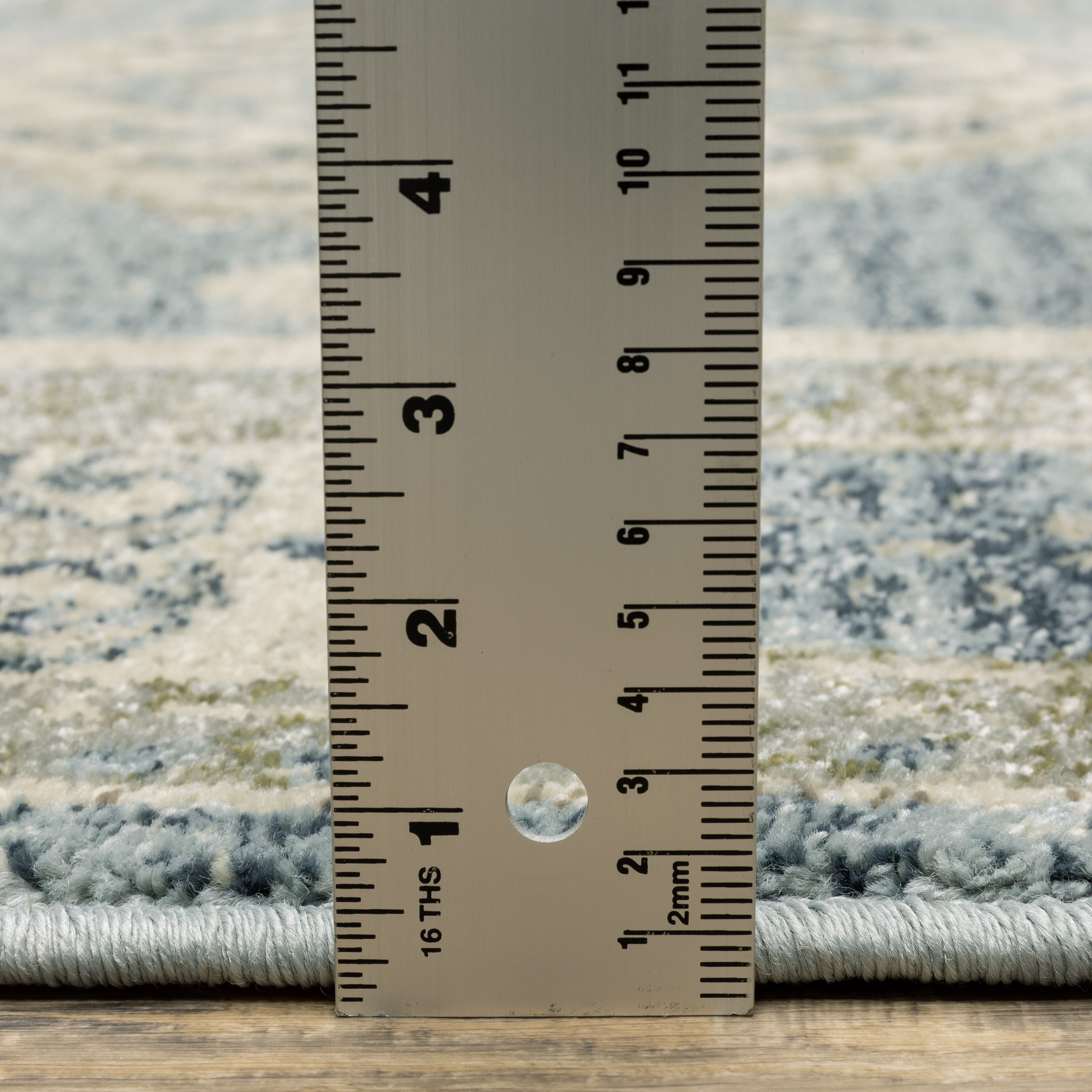 Oriental Weavers Branson BR03A soft transitional rug featuring textured design in blue/ grey tones