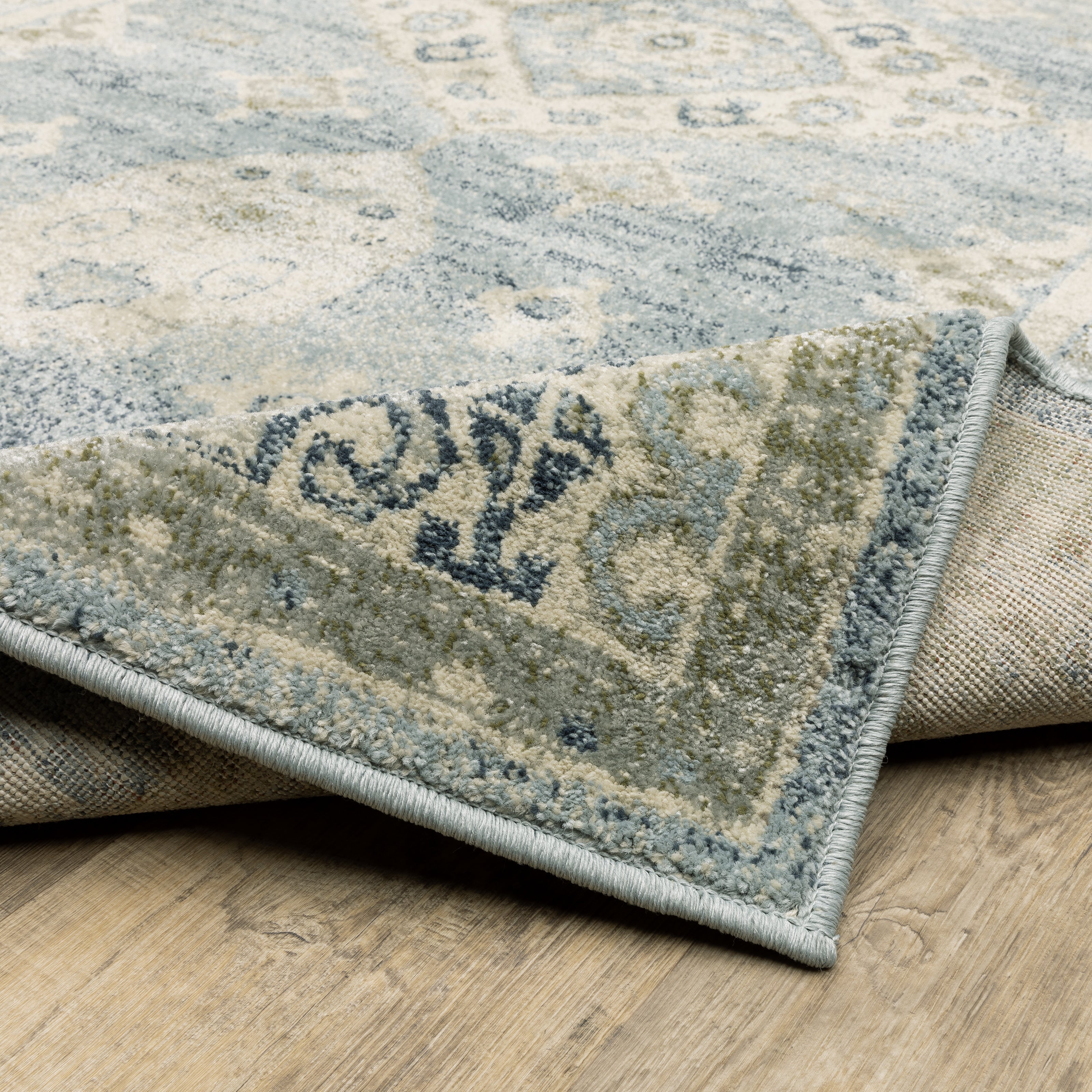 Oriental Weavers Branson BR03A soft transitional rug featuring textured design in blue/ grey tones