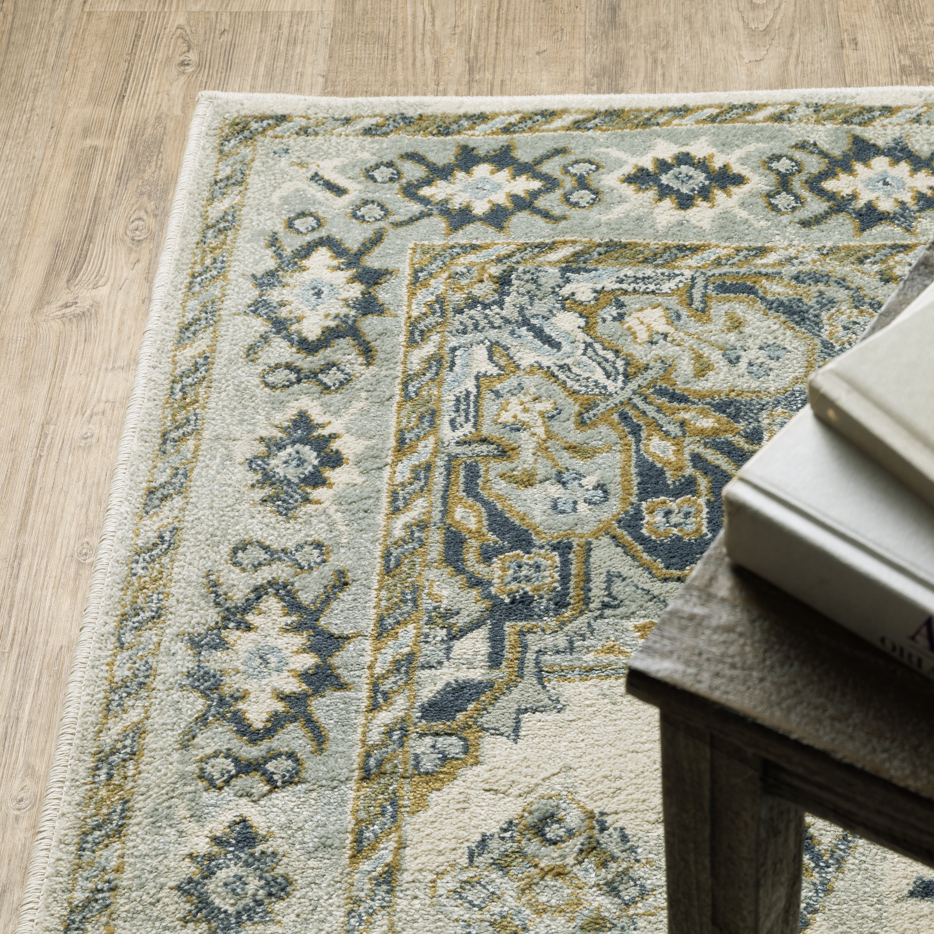 Oriental Weavers Branson BR04B soft transitional rug featuring textured design in ivory/ blue tones
