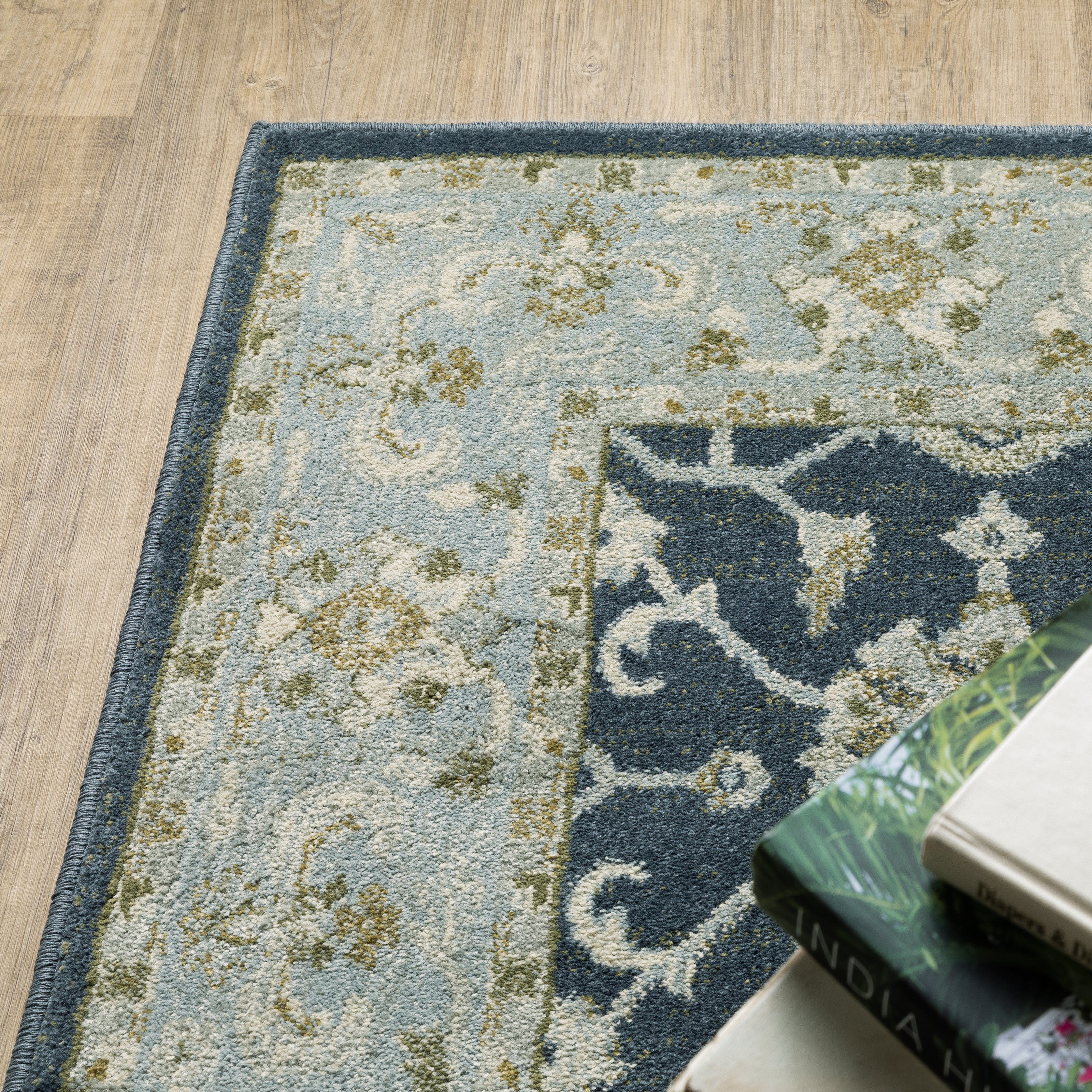 Oriental Weavers Branson BR05A soft transitional rug featuring textured design in teal blue/ ivory tones