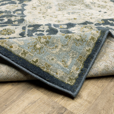 Oriental Weavers Branson BR05A soft transitional rug featuring textured design in teal blue/ ivory tones