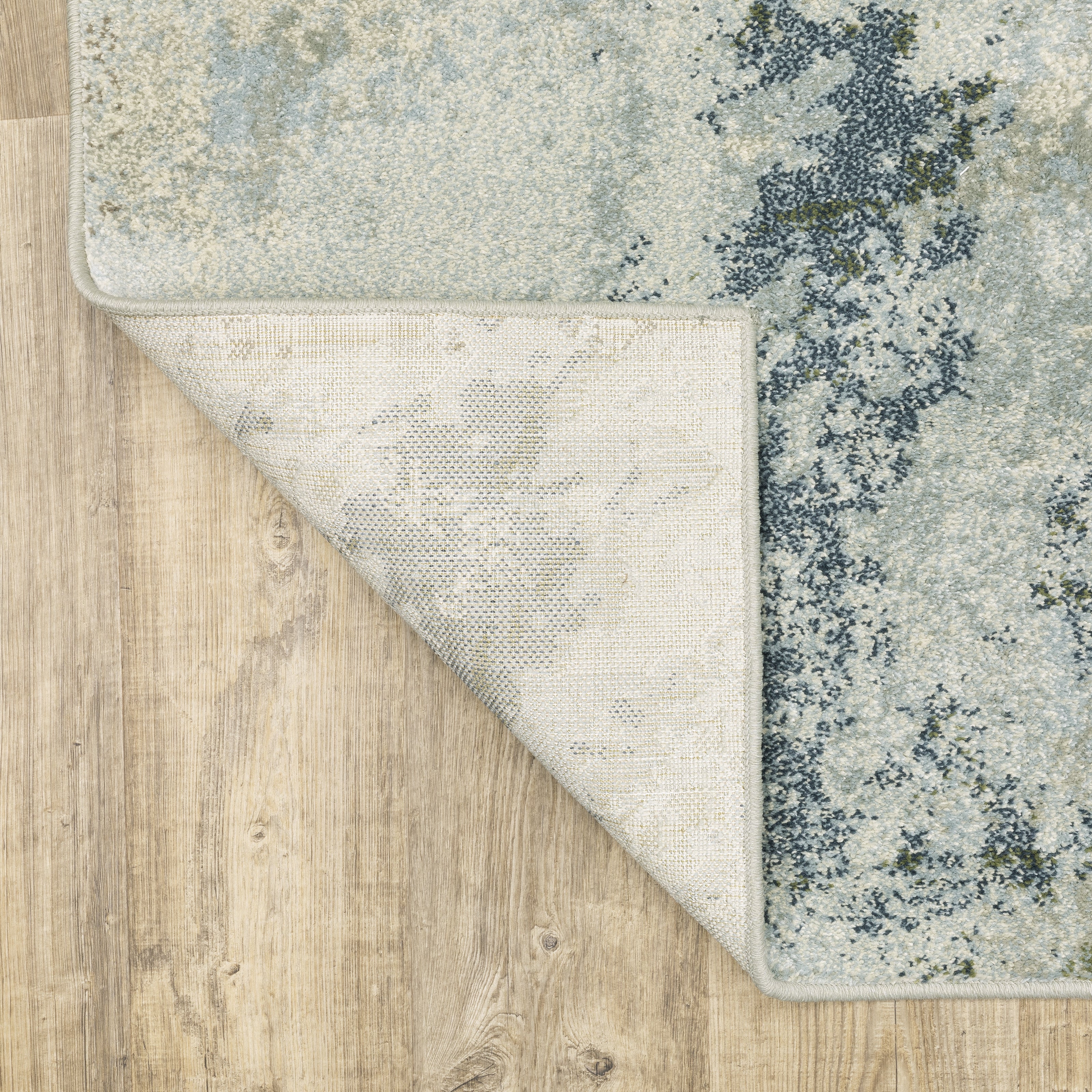 Oriental Weavers Branson BR08A soft transitional rug featuring textured design in blue/ green tones