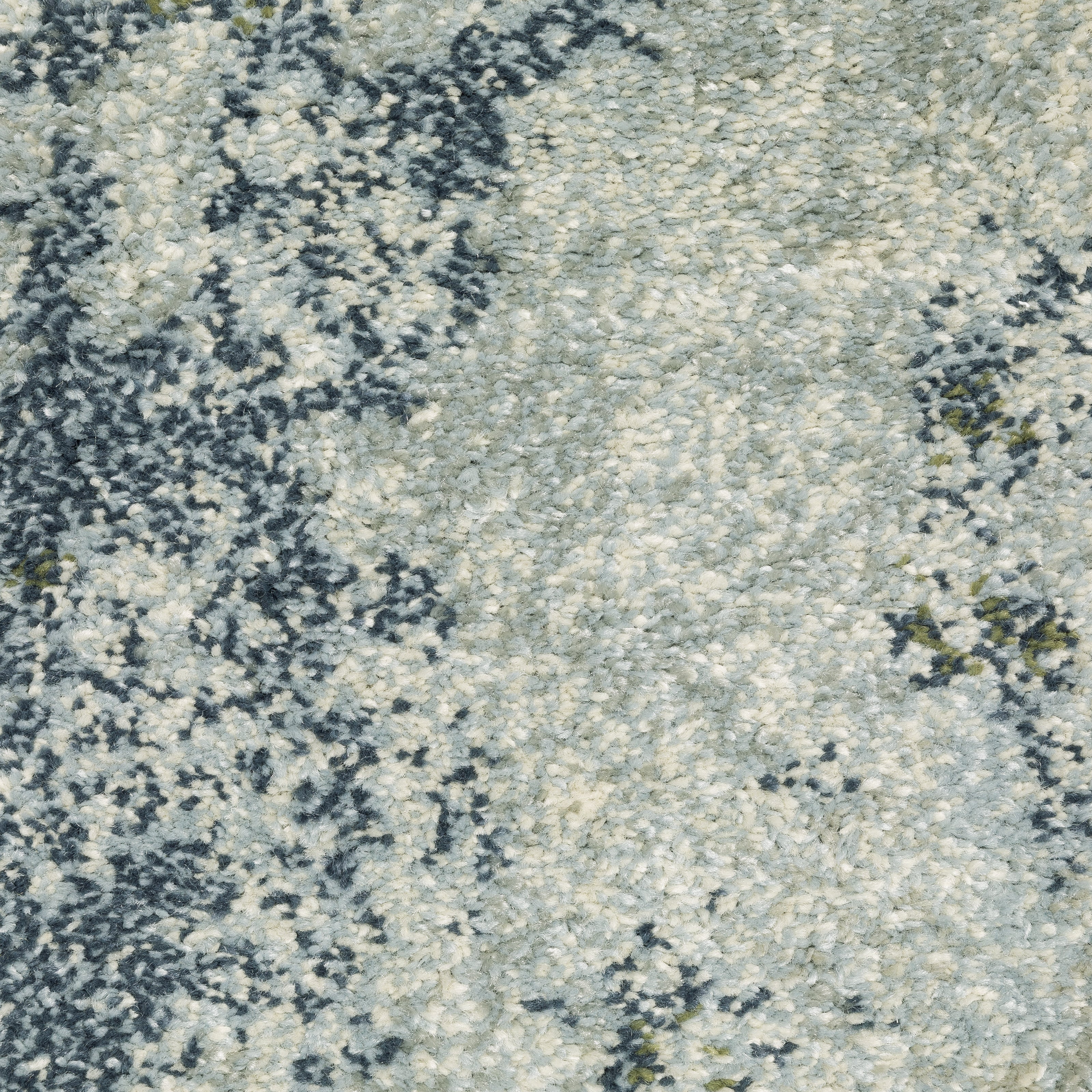 Oriental Weavers Branson BR08A soft transitional rug featuring textured design in blue/ green tones