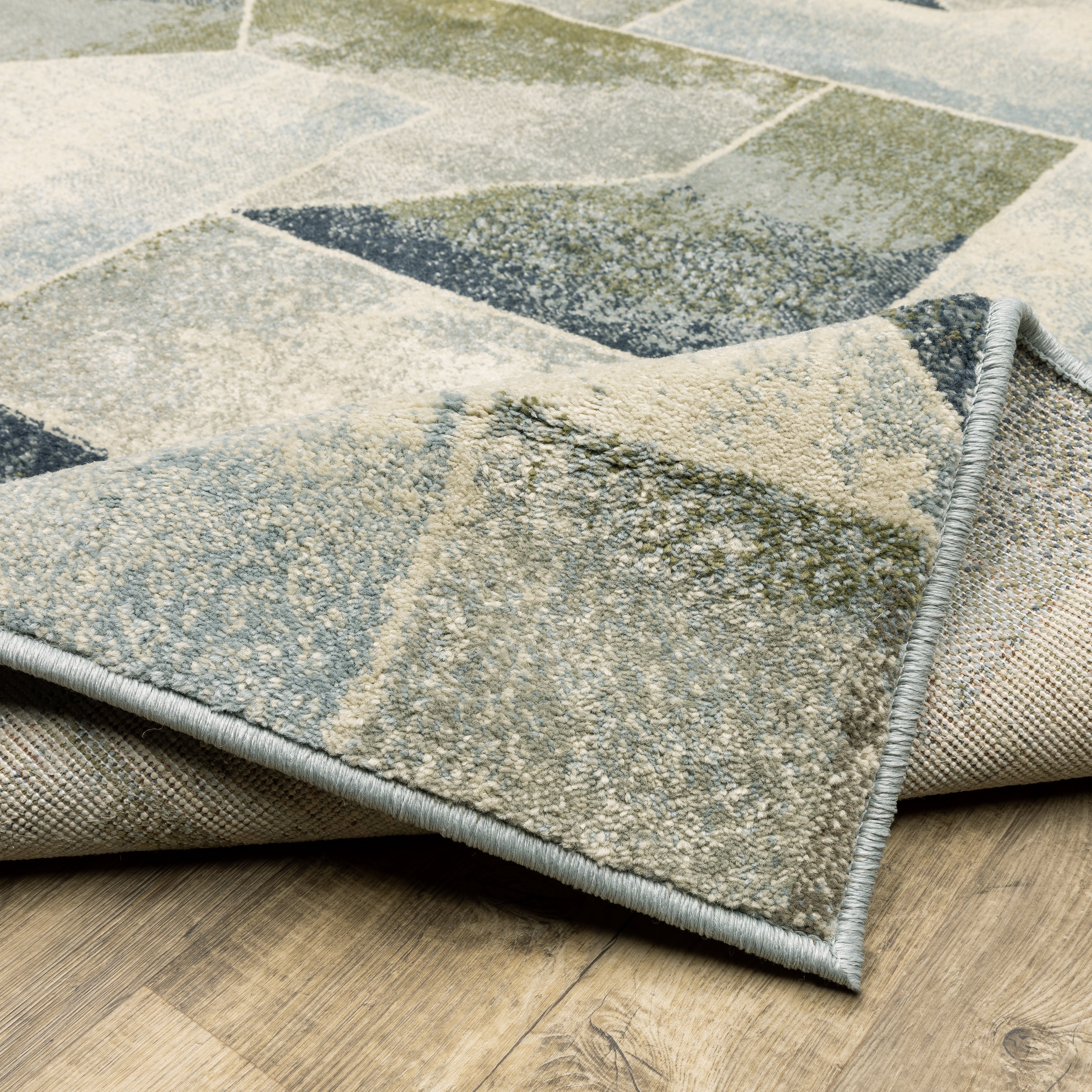 Oriental Weavers Branson BR10A soft transitional rug featuring textured design in blue/ green tones