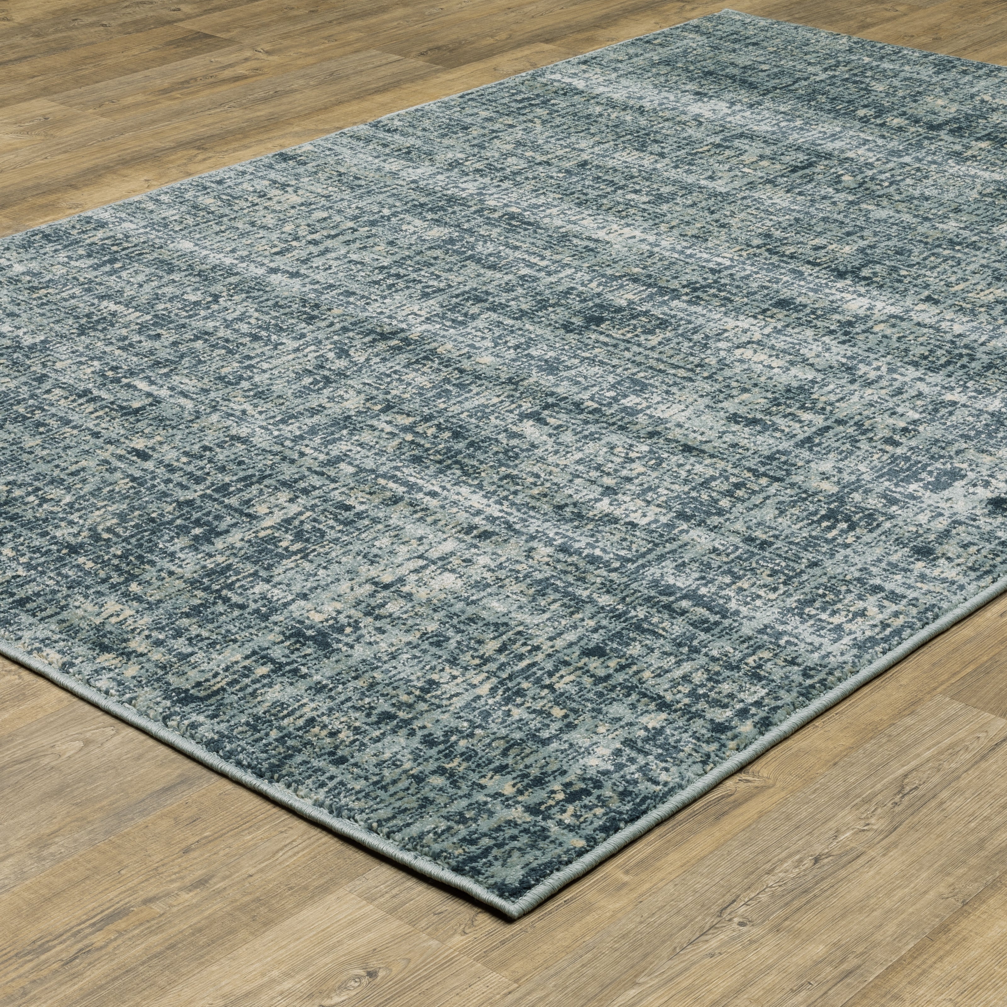 Oriental Weavers Branson BR13A soft transitional rug featuring textured design in blue/ grey tones