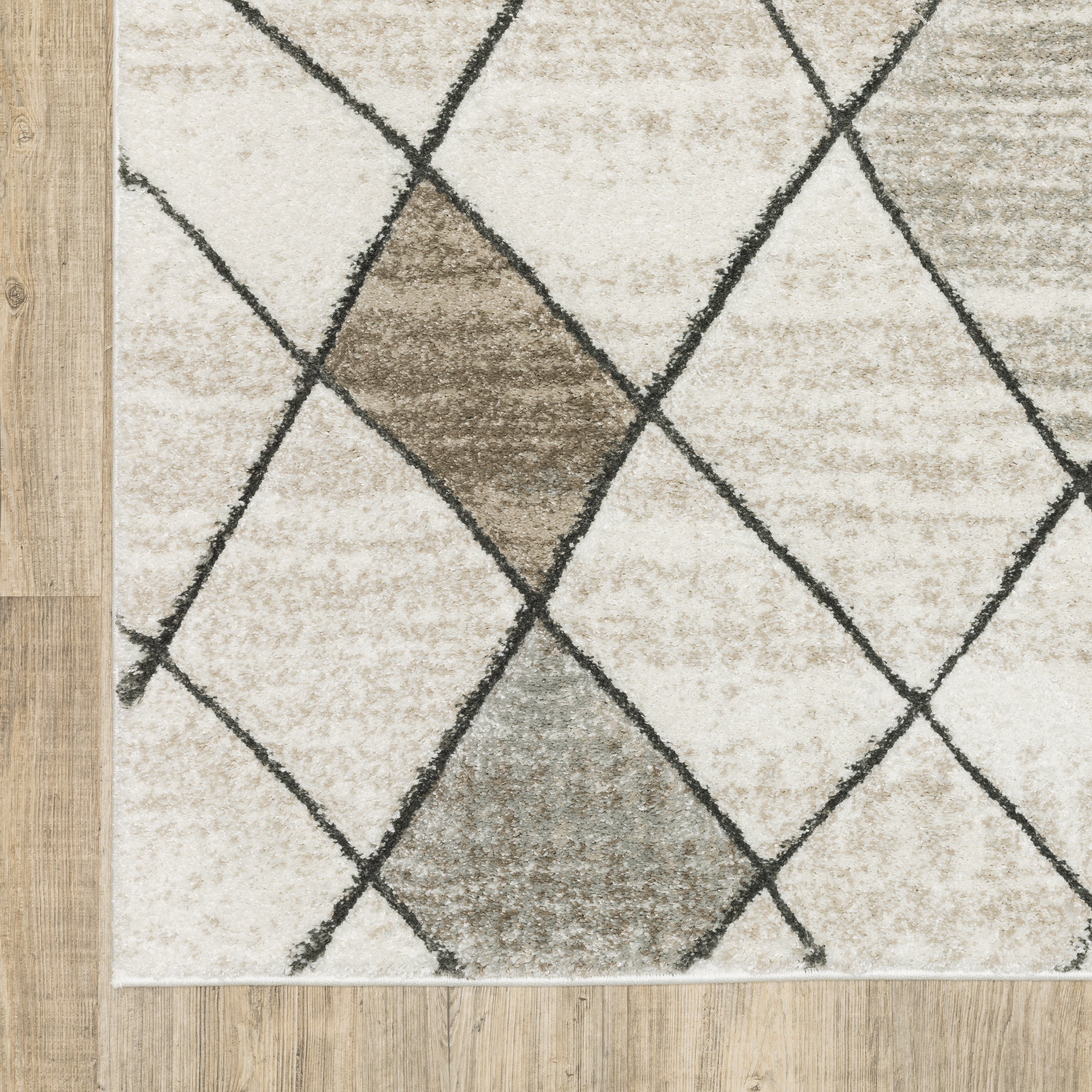 Oriental Weavers Cambria 4928A plush modern rug featuring abstract pattern in beige/ grey tones