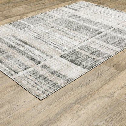 Oriental Weavers Cambria 055X2 plush modern rug featuring abstract pattern in tan/ charcoal tones