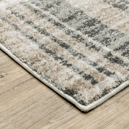 Oriental Weavers Cambria 055X2 plush modern rug featuring abstract pattern in tan/ charcoal tones