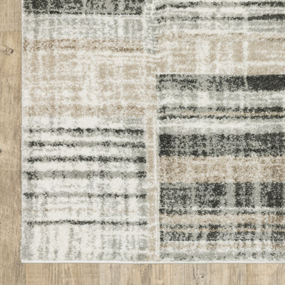 Oriental Weavers Cambria 055X2 plush modern rug featuring abstract pattern in tan/ charcoal tones