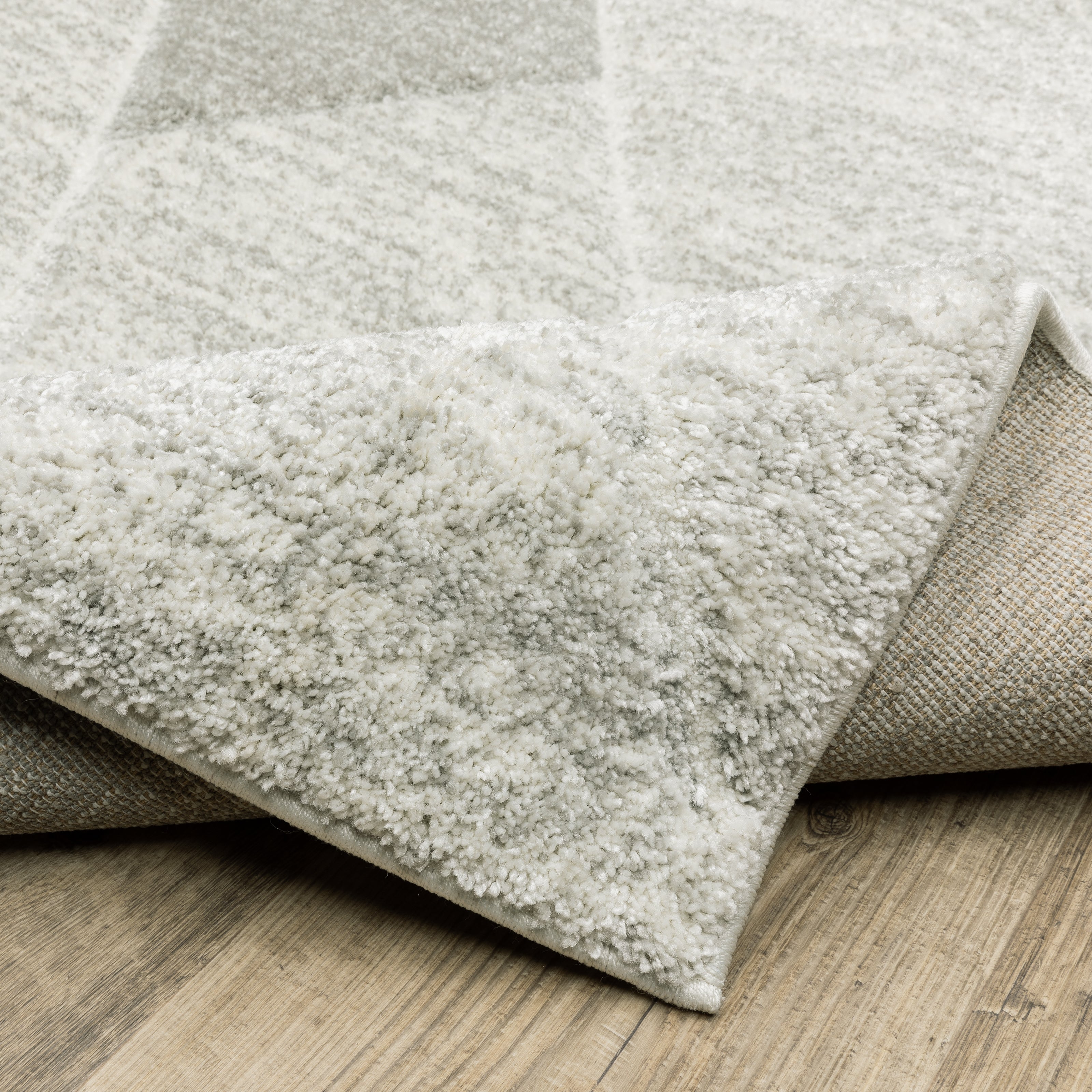 Oriental Weavers Cambria 005W2 plush modern rug featuring abstract pattern in grey/ ivory tones