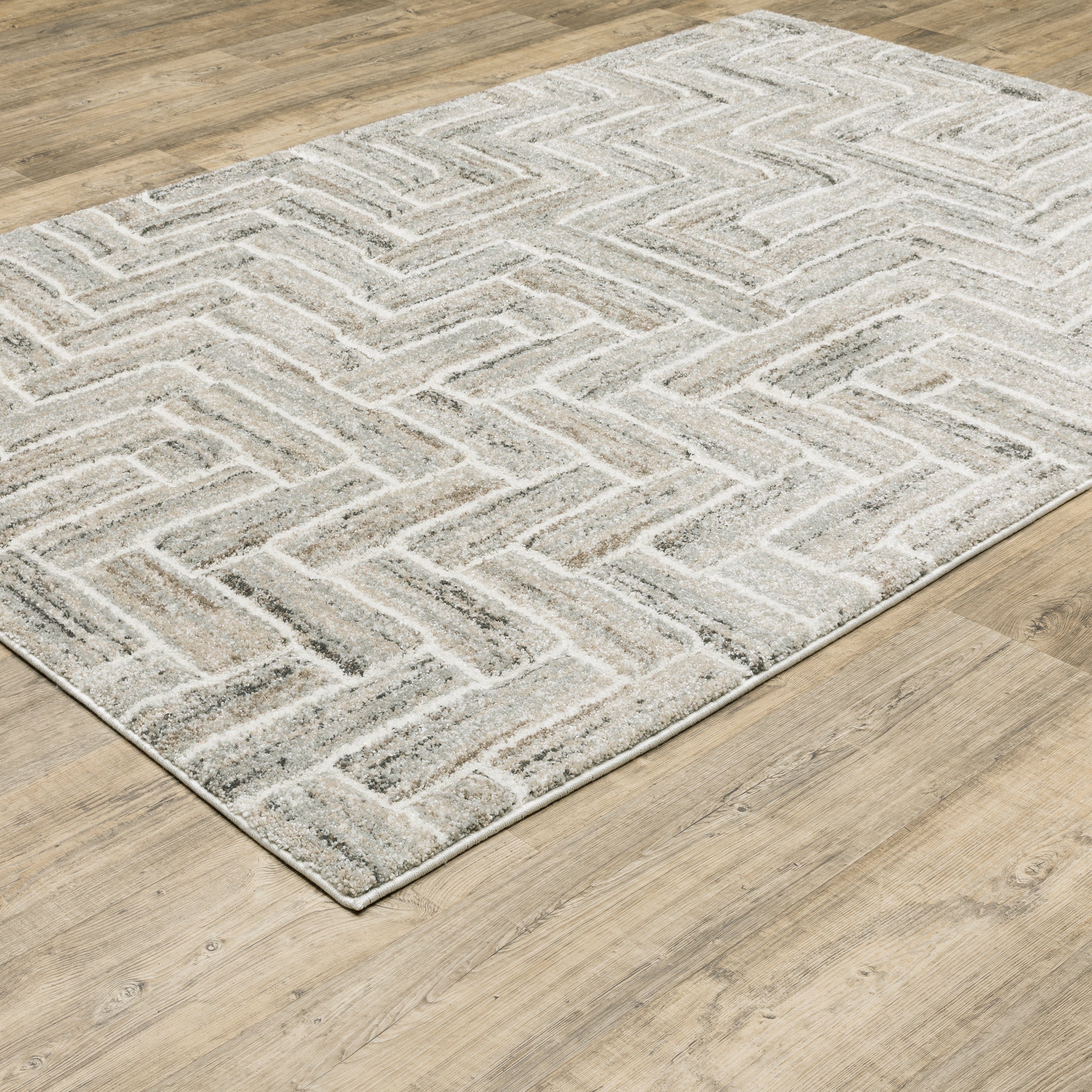 Oriental Weavers Cambria 093L2 plush modern rug featuring abstract pattern in ivory/ beige tones